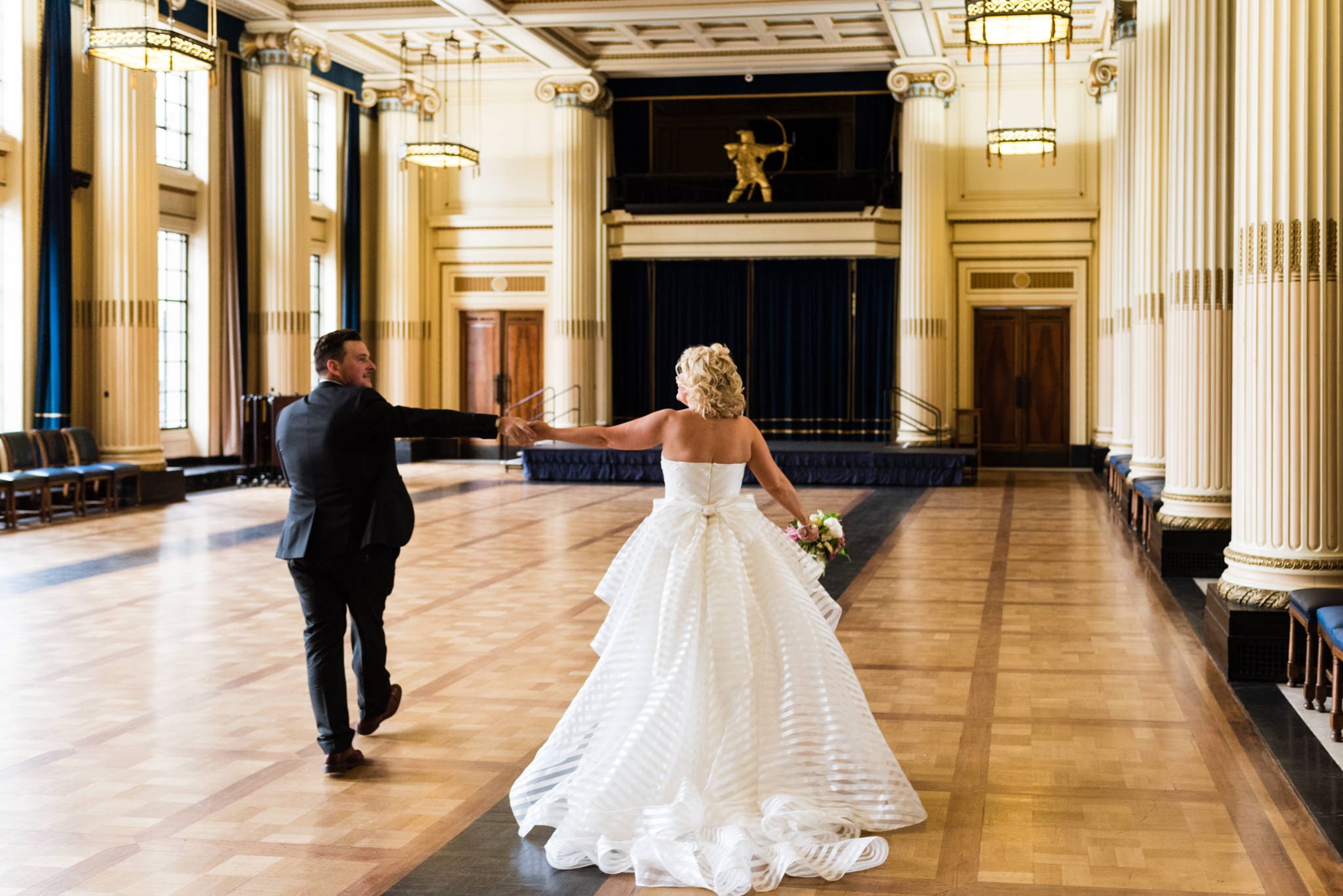 newlyweds dancing in the great hall