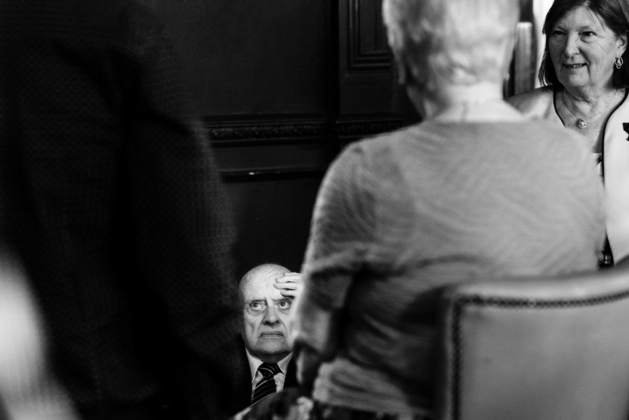 elderly gentleman having a sit down