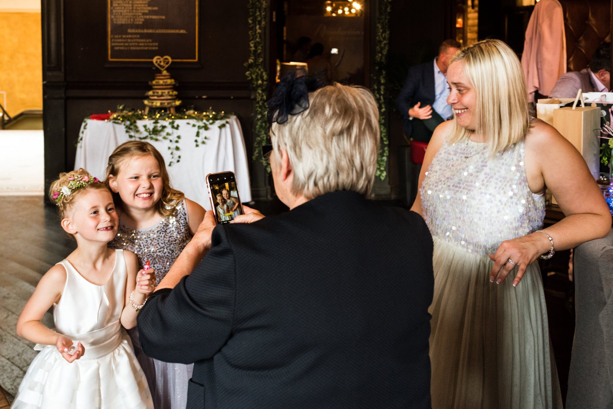 gran taking photos of her grandkids