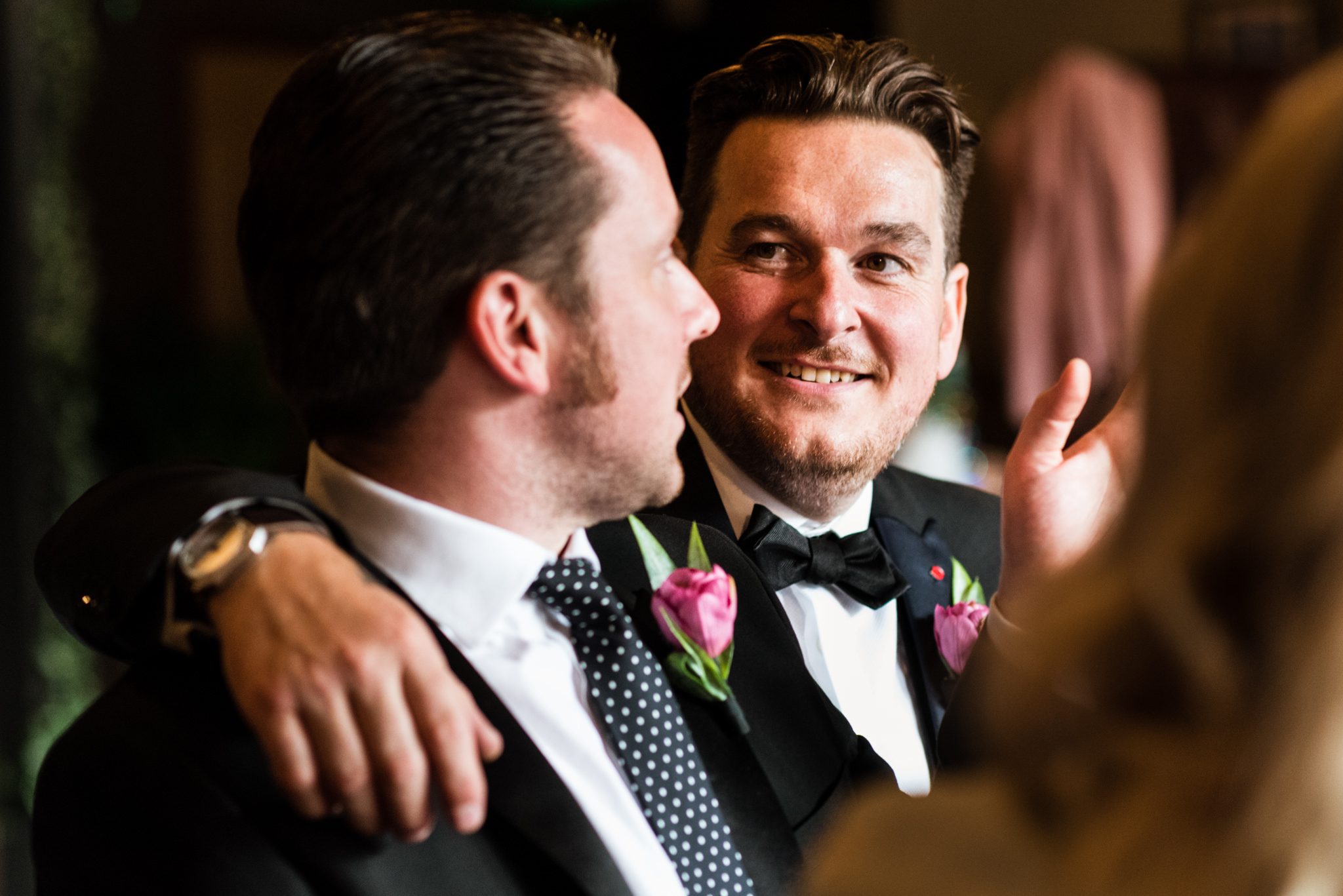 groom having a moment with his best man