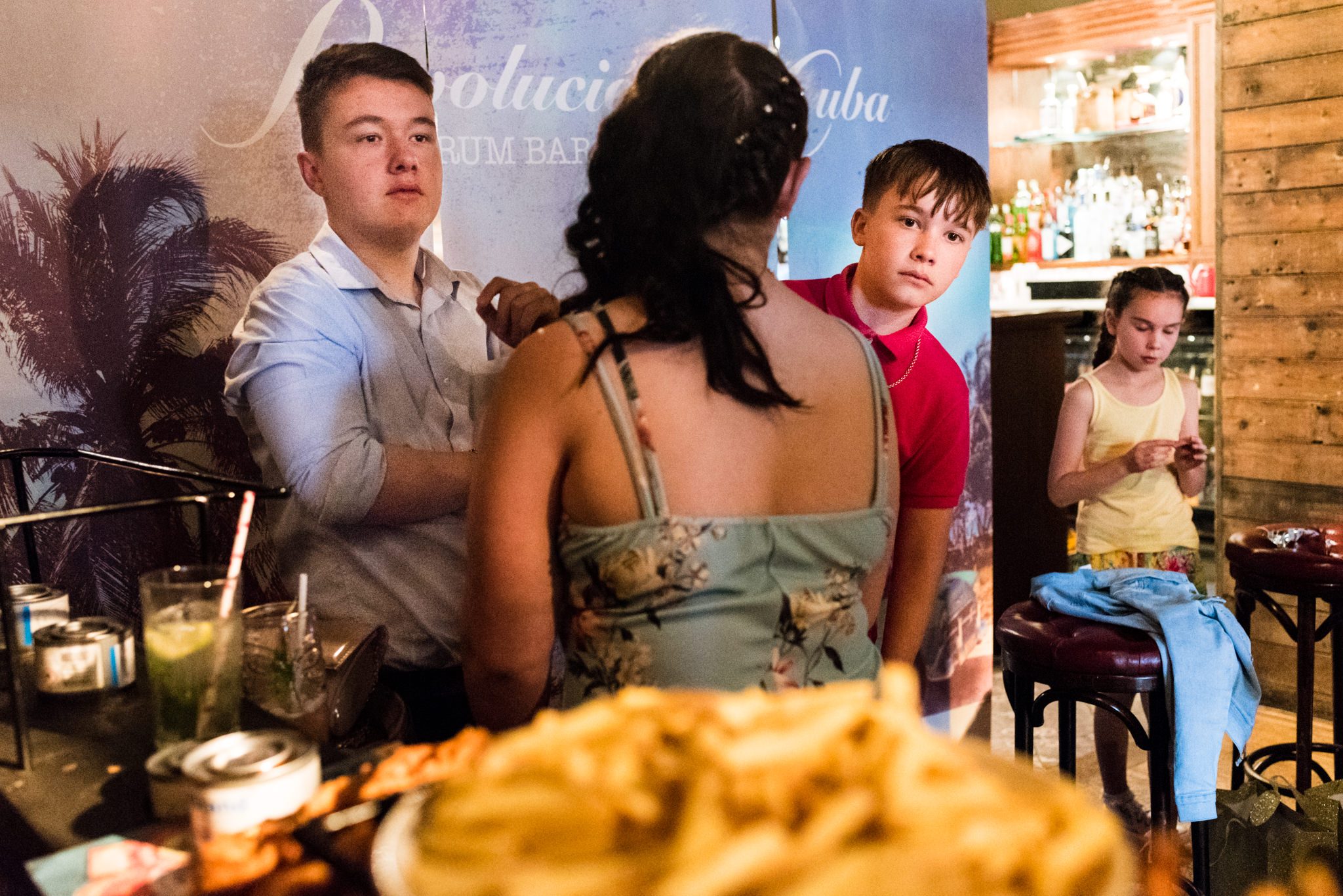 couple of lads eyeing up a plate of chips