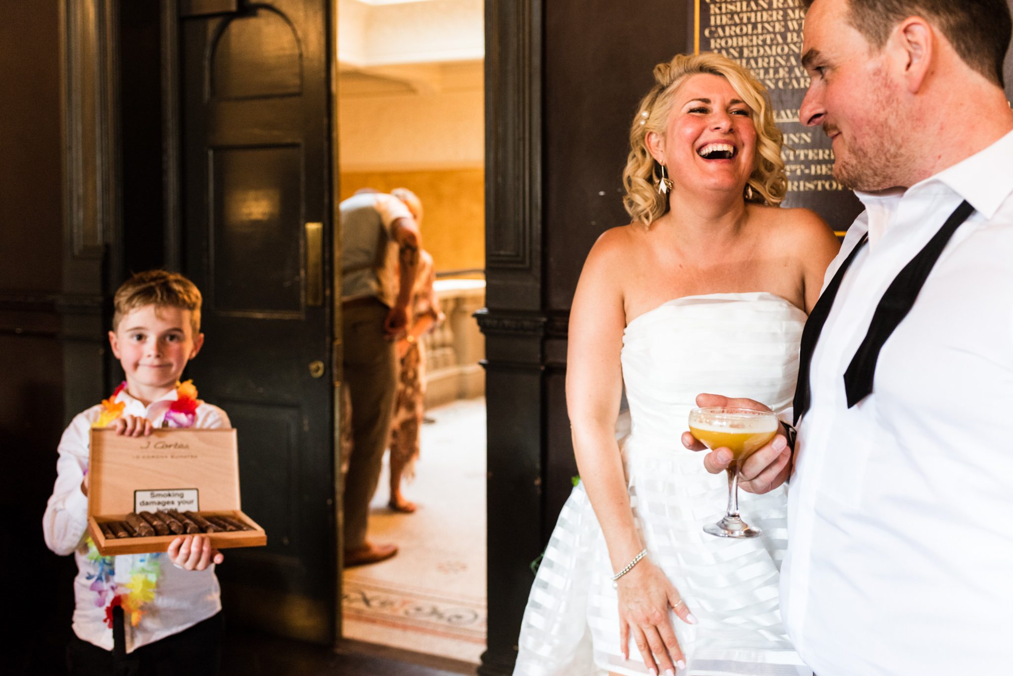 bride and groom laughing