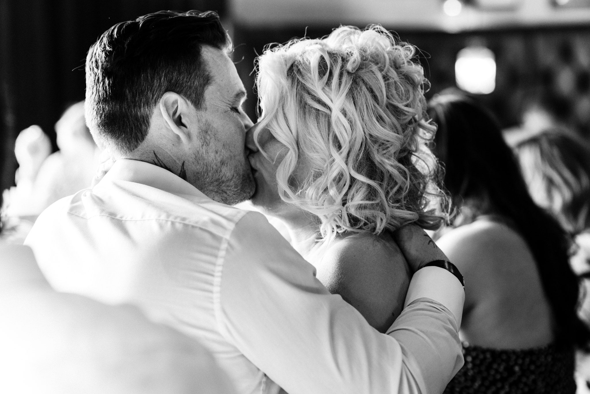bride and groom sharing a kiss