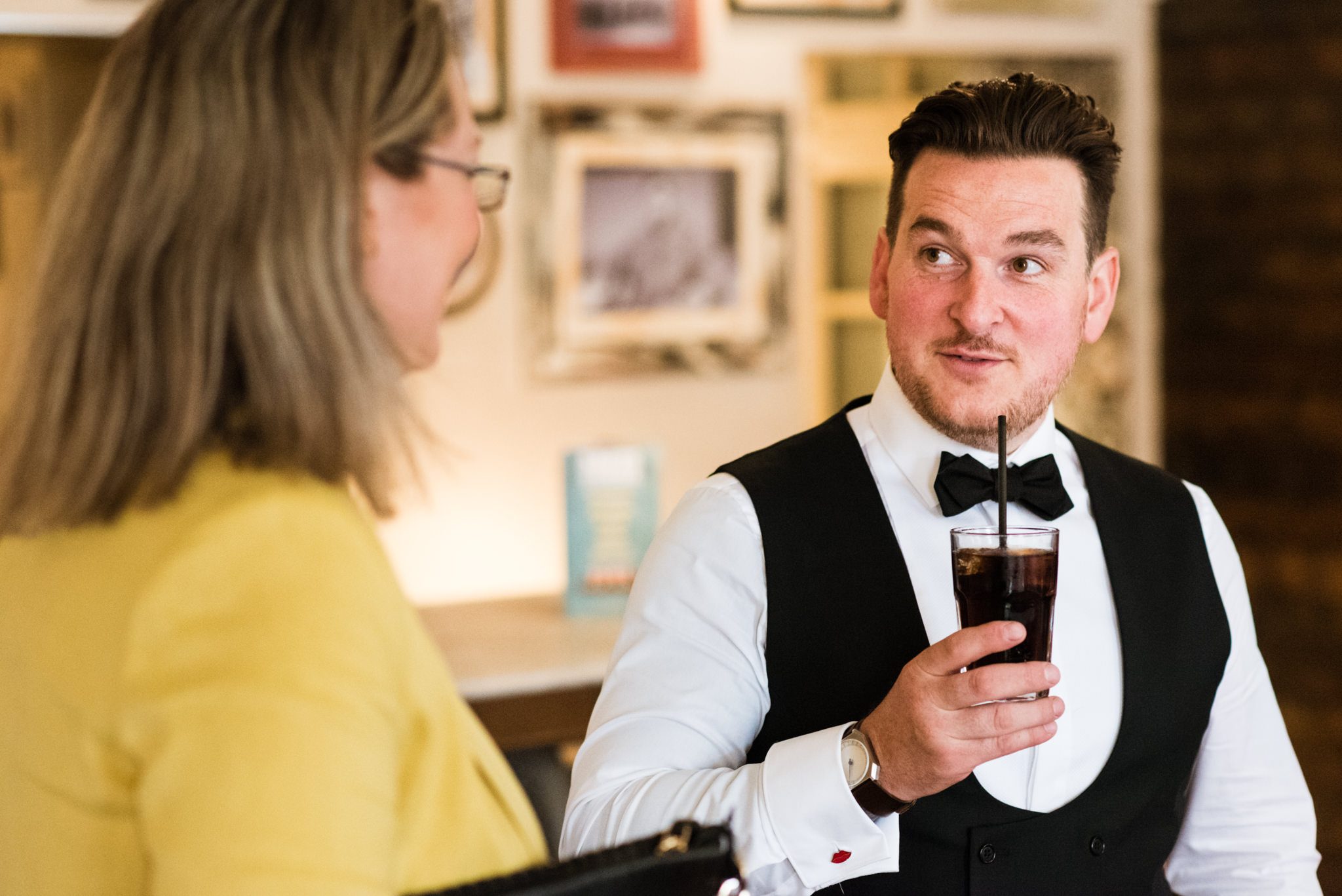groom enjoying a pre-wedding drink