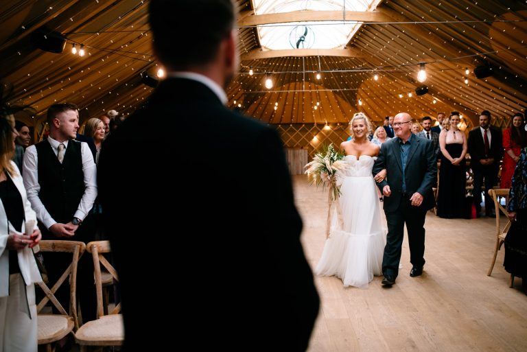 thorpe garden wedding bride walking down the aisle