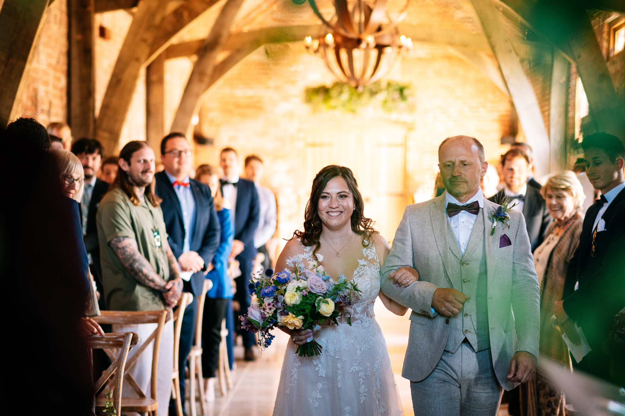 bride walking down the aisle at grangefields with her dad
