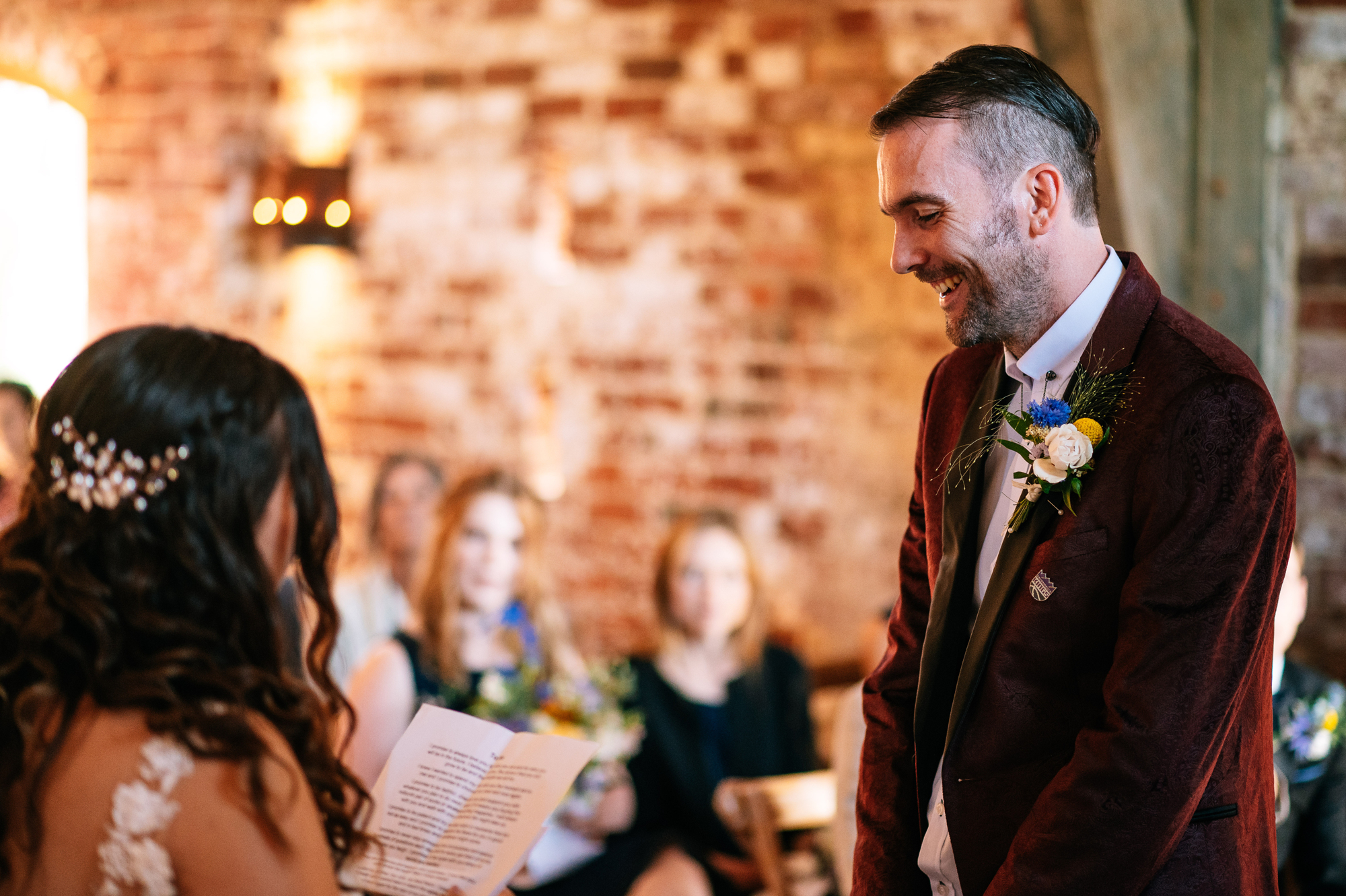 smiling groom getting married at grangefields