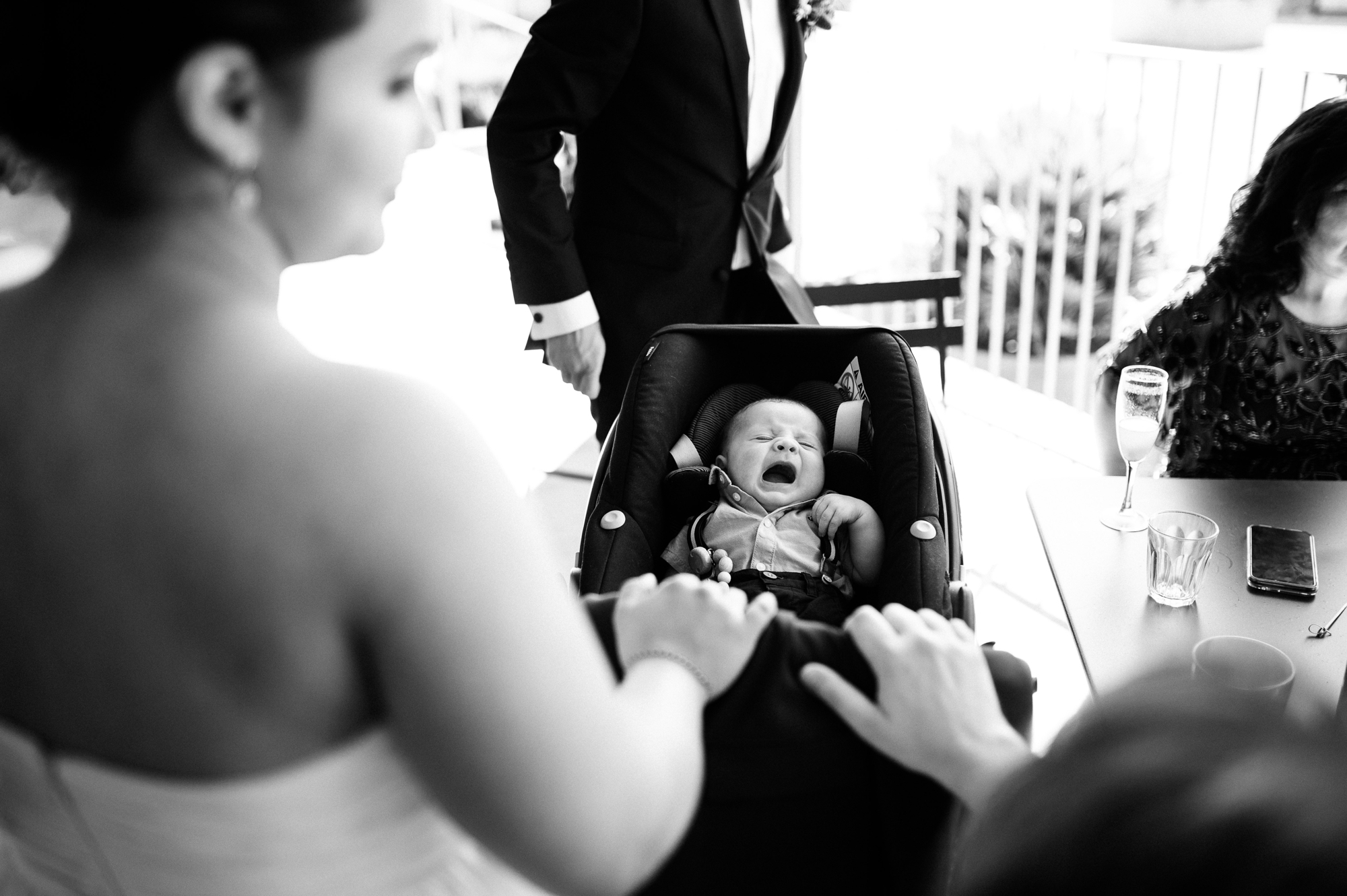 crying baby in pushchair