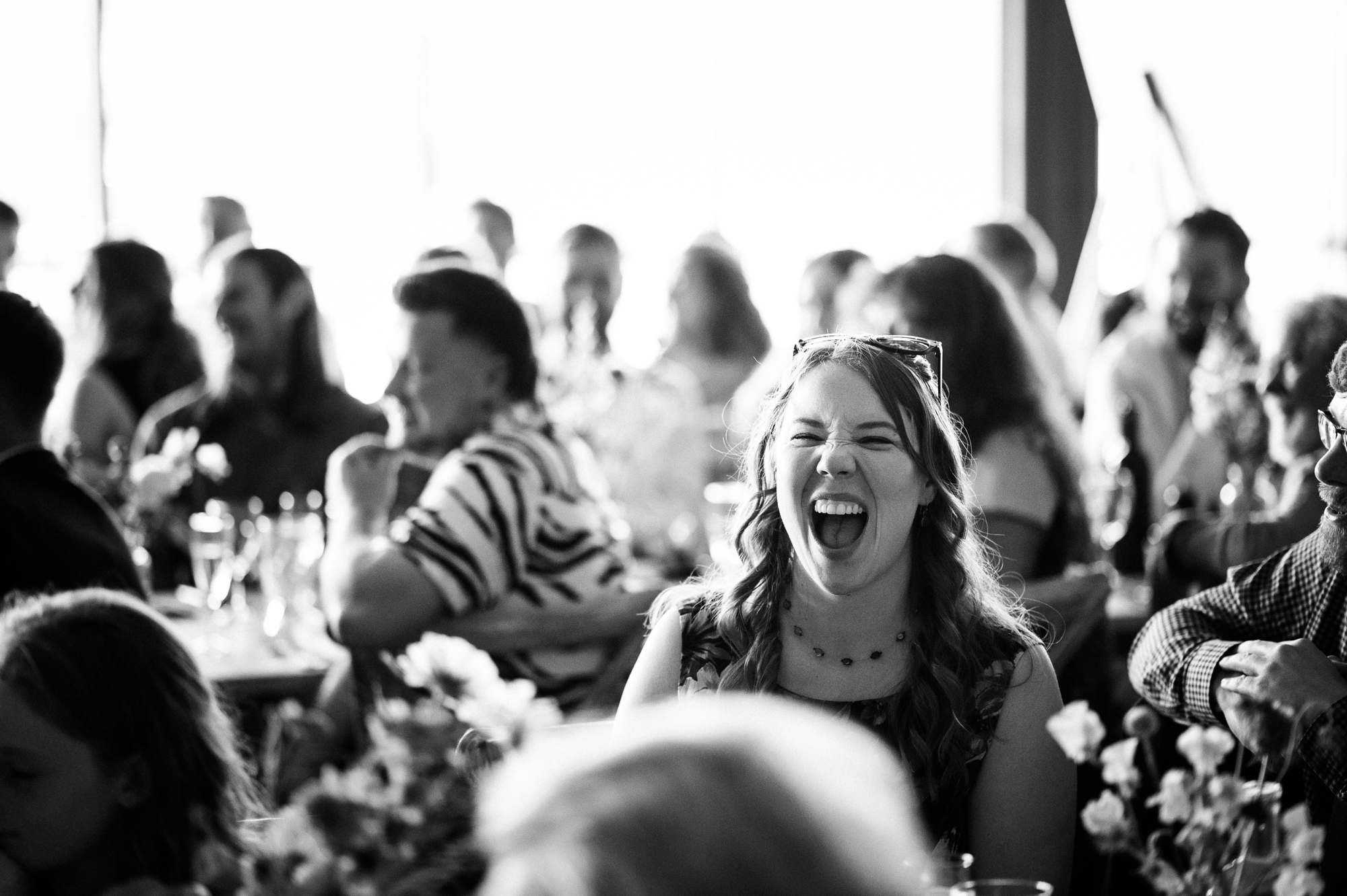 guest laughing during speeches