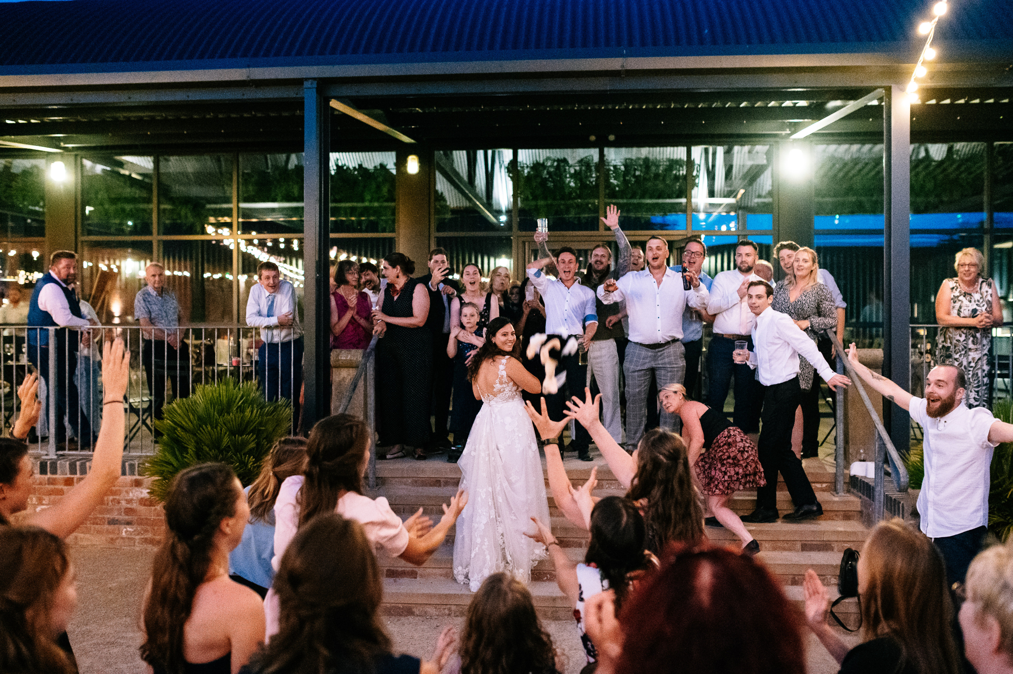 bride throwing bouquet at grangefields