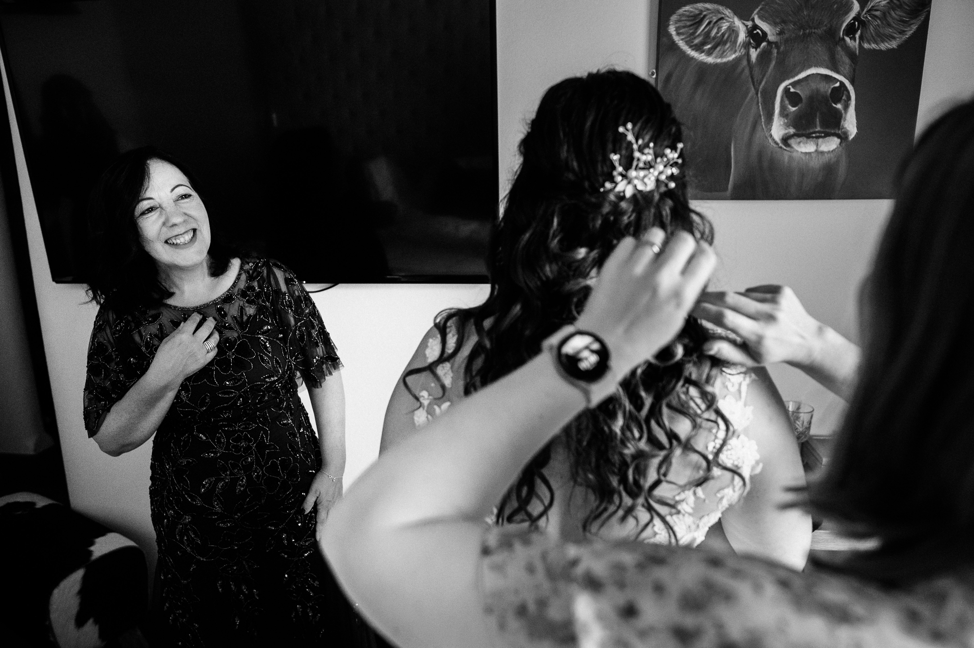 happy mother of the bride looking at her daughter