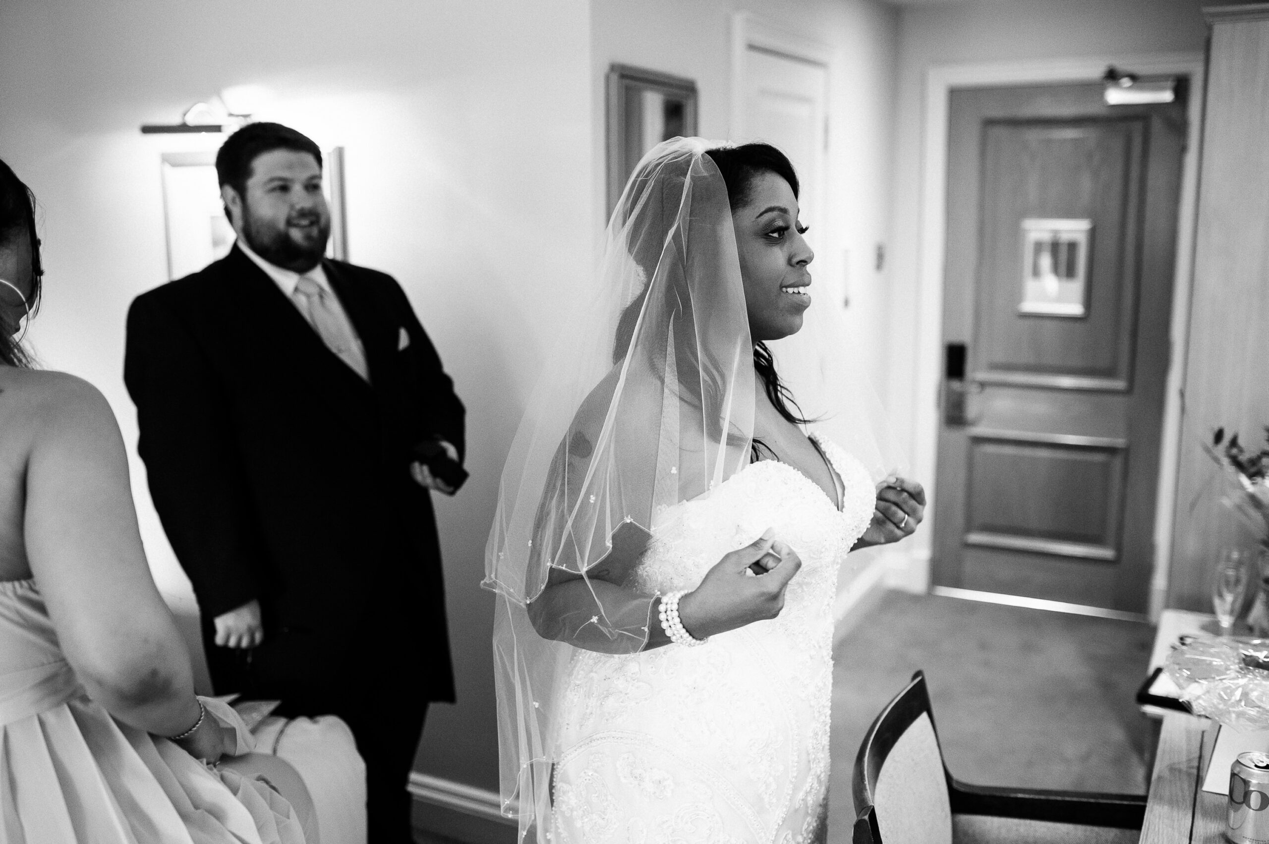 bride and groom together in the hotel room before the ceremony