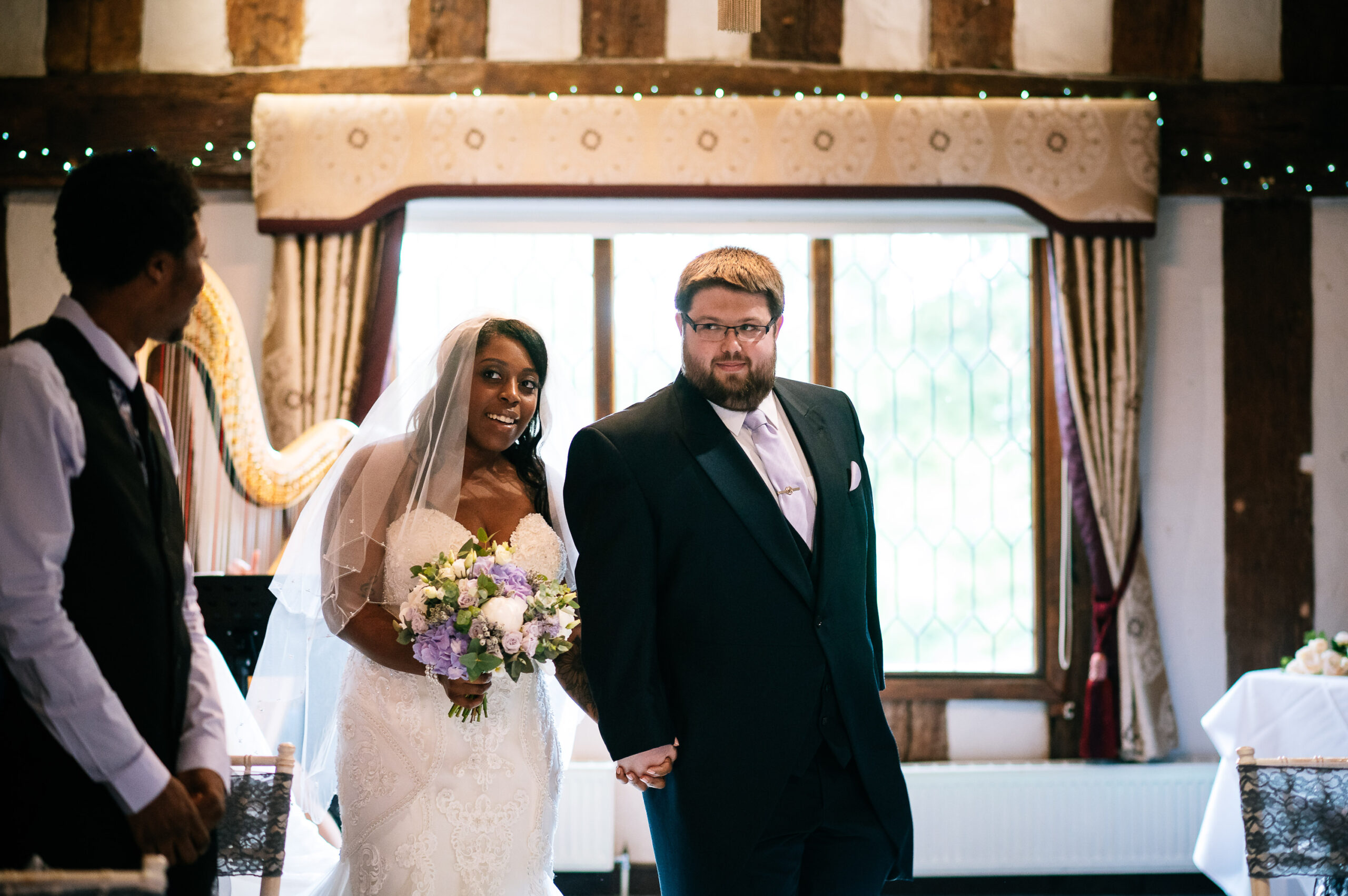 bride and groom walking each other down the aisle
