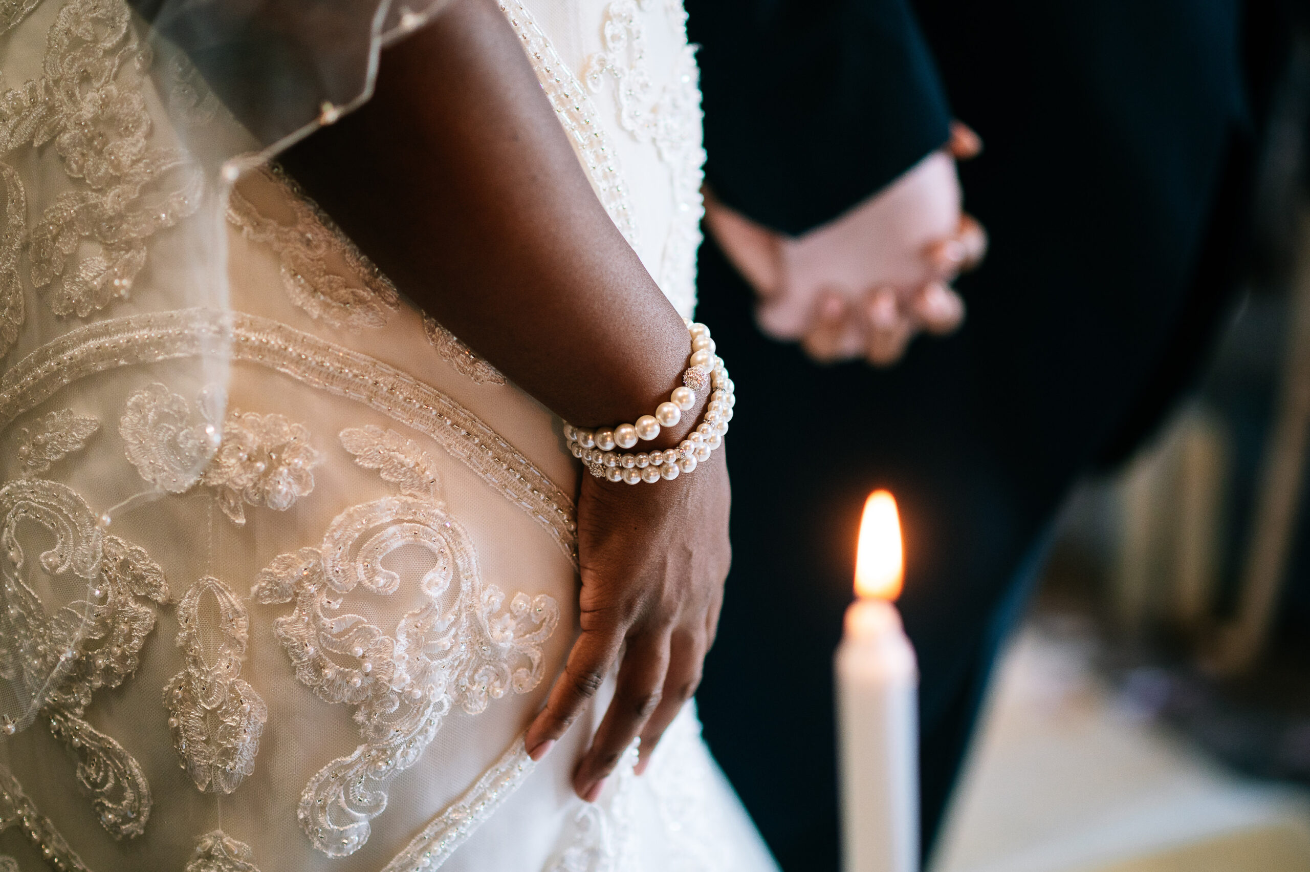 closeup of brides pearl bracelet