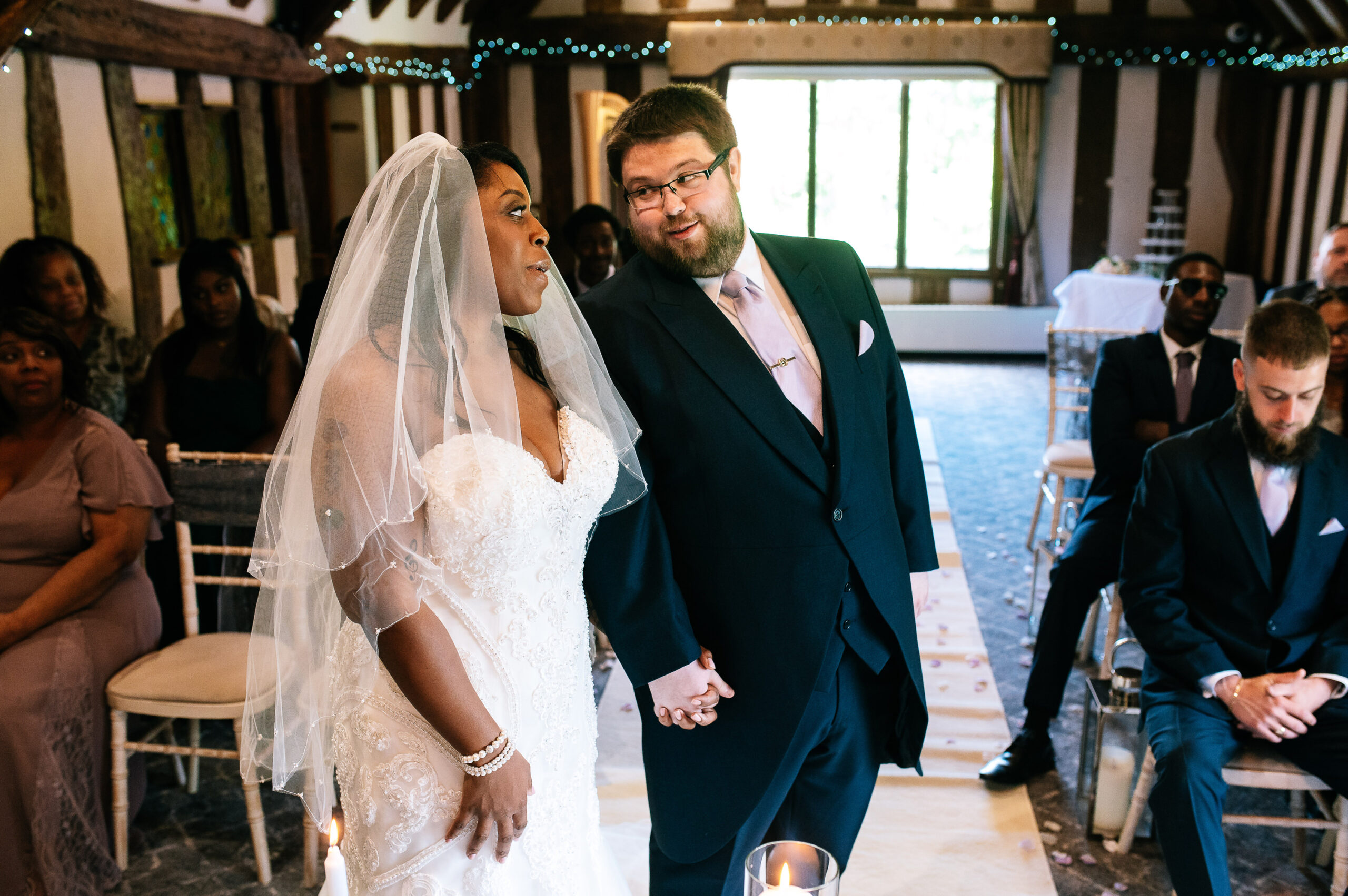 bride and groom sharing a joke during the ceremony
