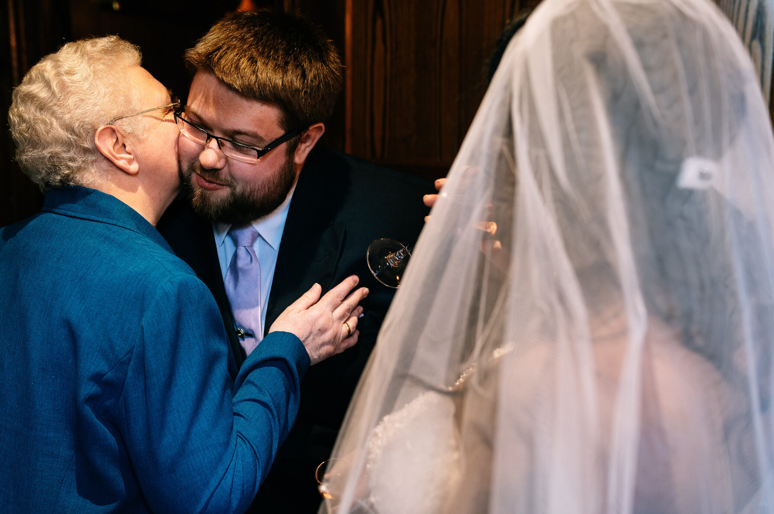 groom hugging his grandma