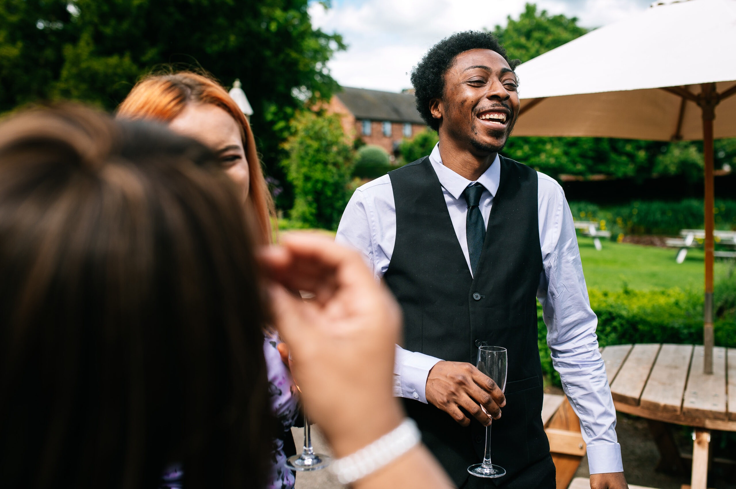 bride's brother laughing