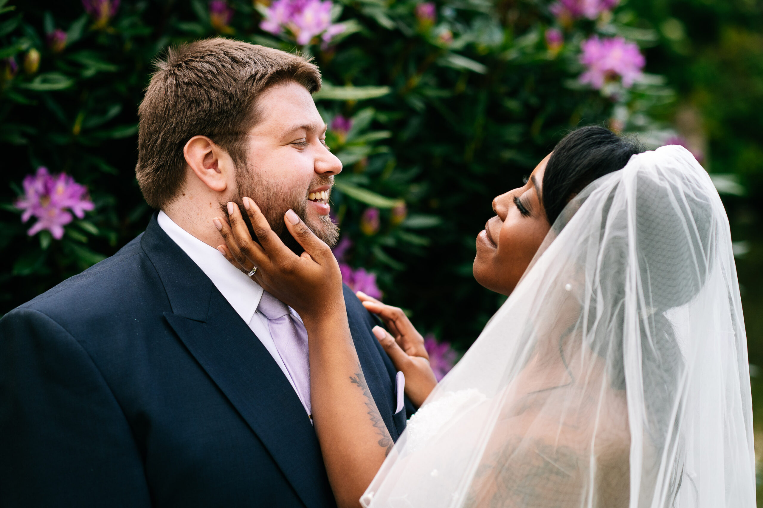 a tender moment as the couple have some relaxed portraits