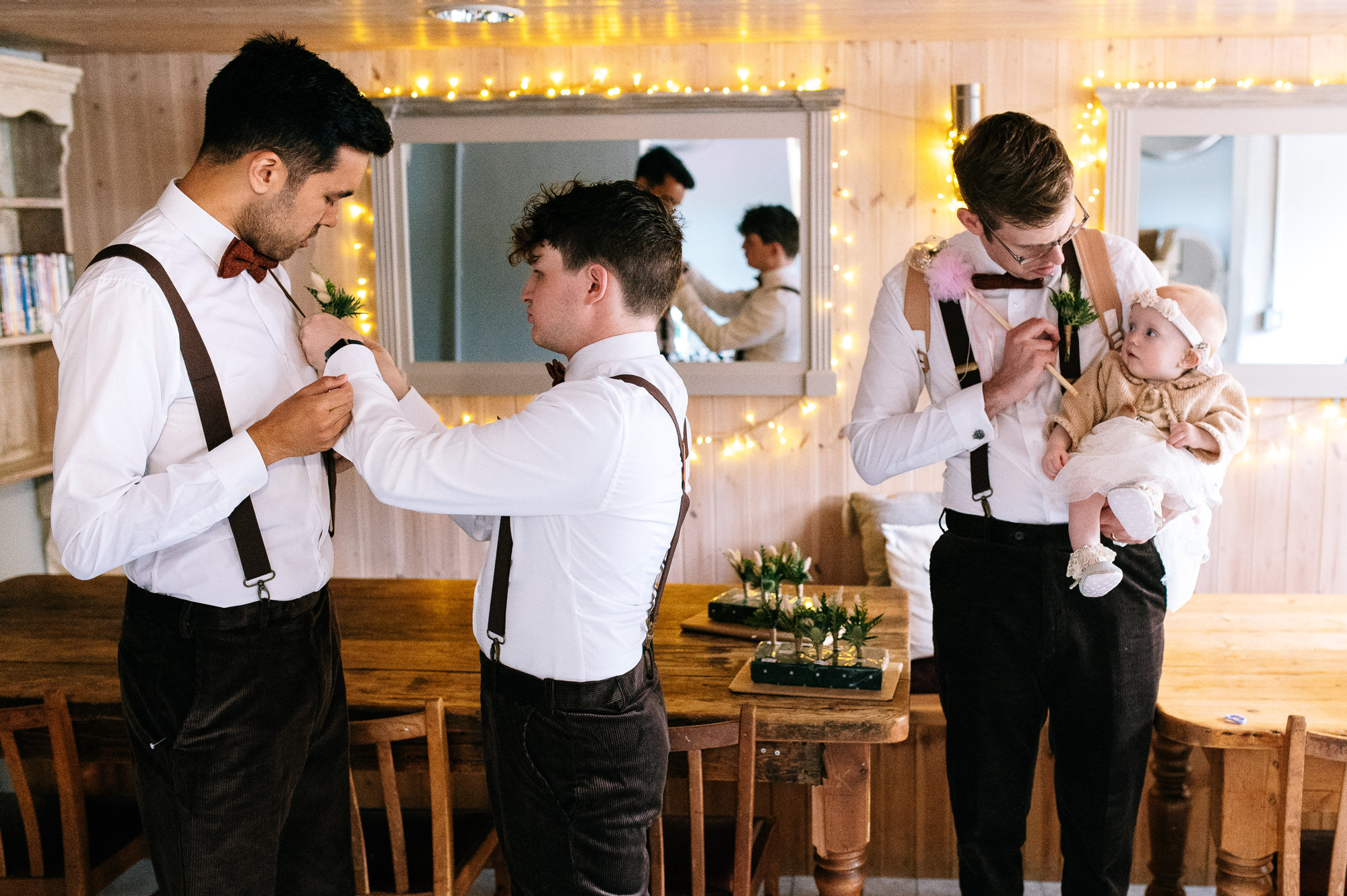 groomsmen wearing braces and bowties