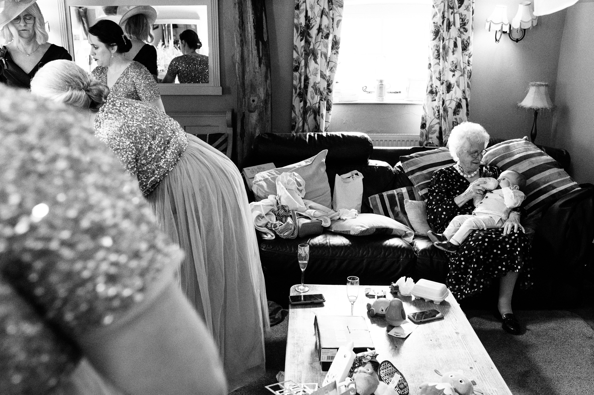 grandma quietly holding the baby