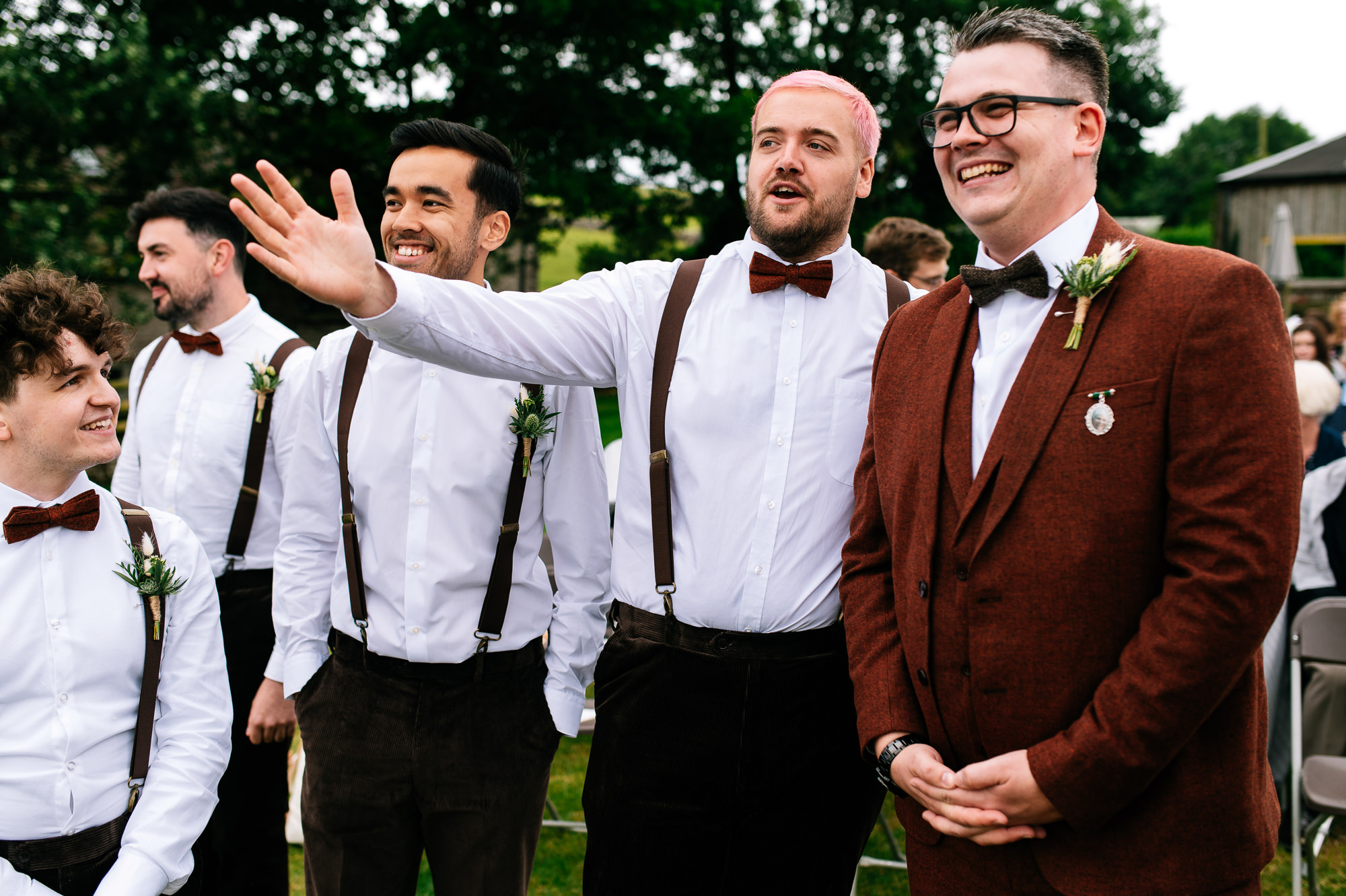 happy groom with his groomsmen