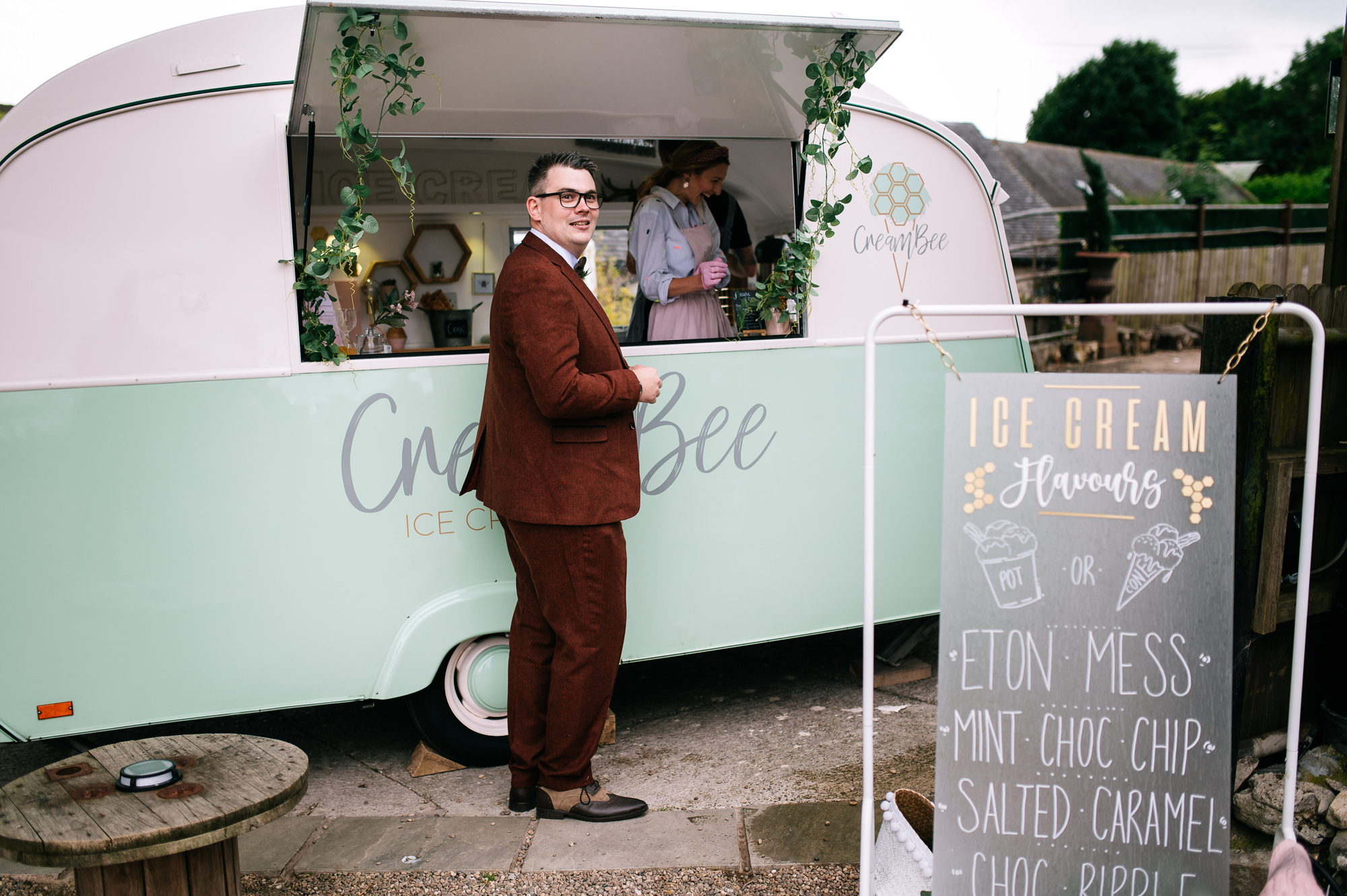 groom at the front of the queue for icecream