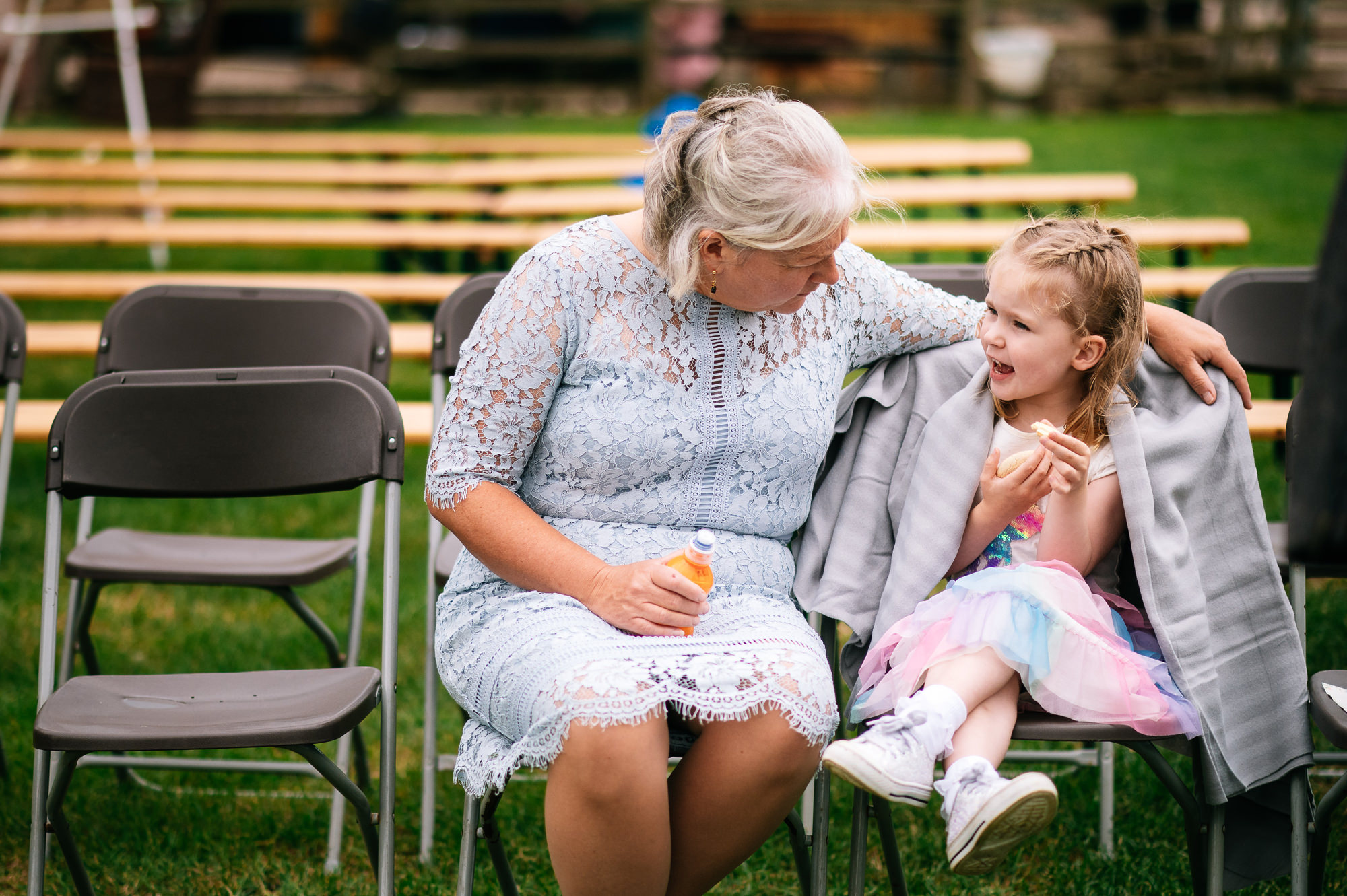 little girl having a chat with an older lady