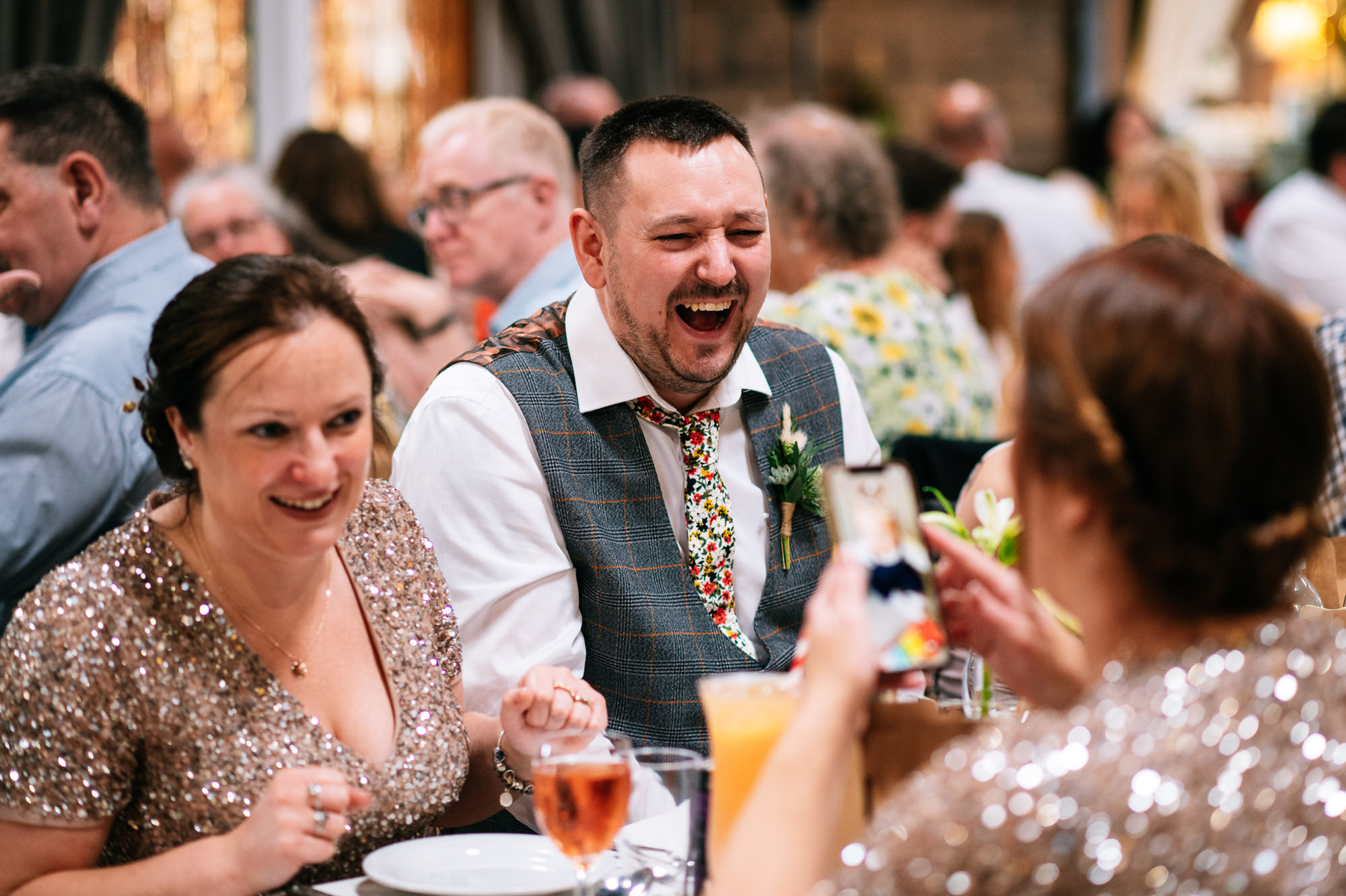 laughing guests during the speeches