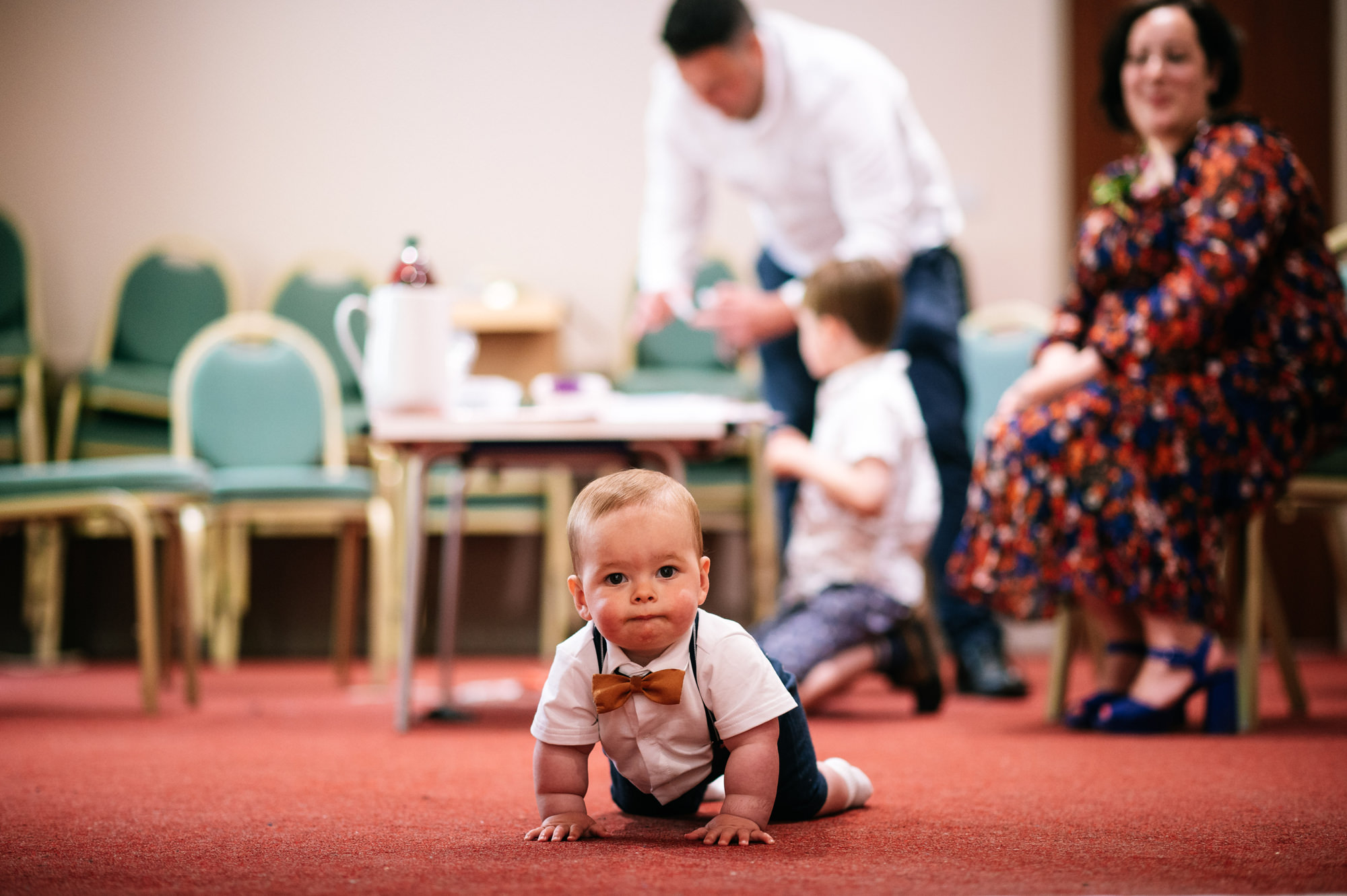 baby crawling on the carpet towards the camera