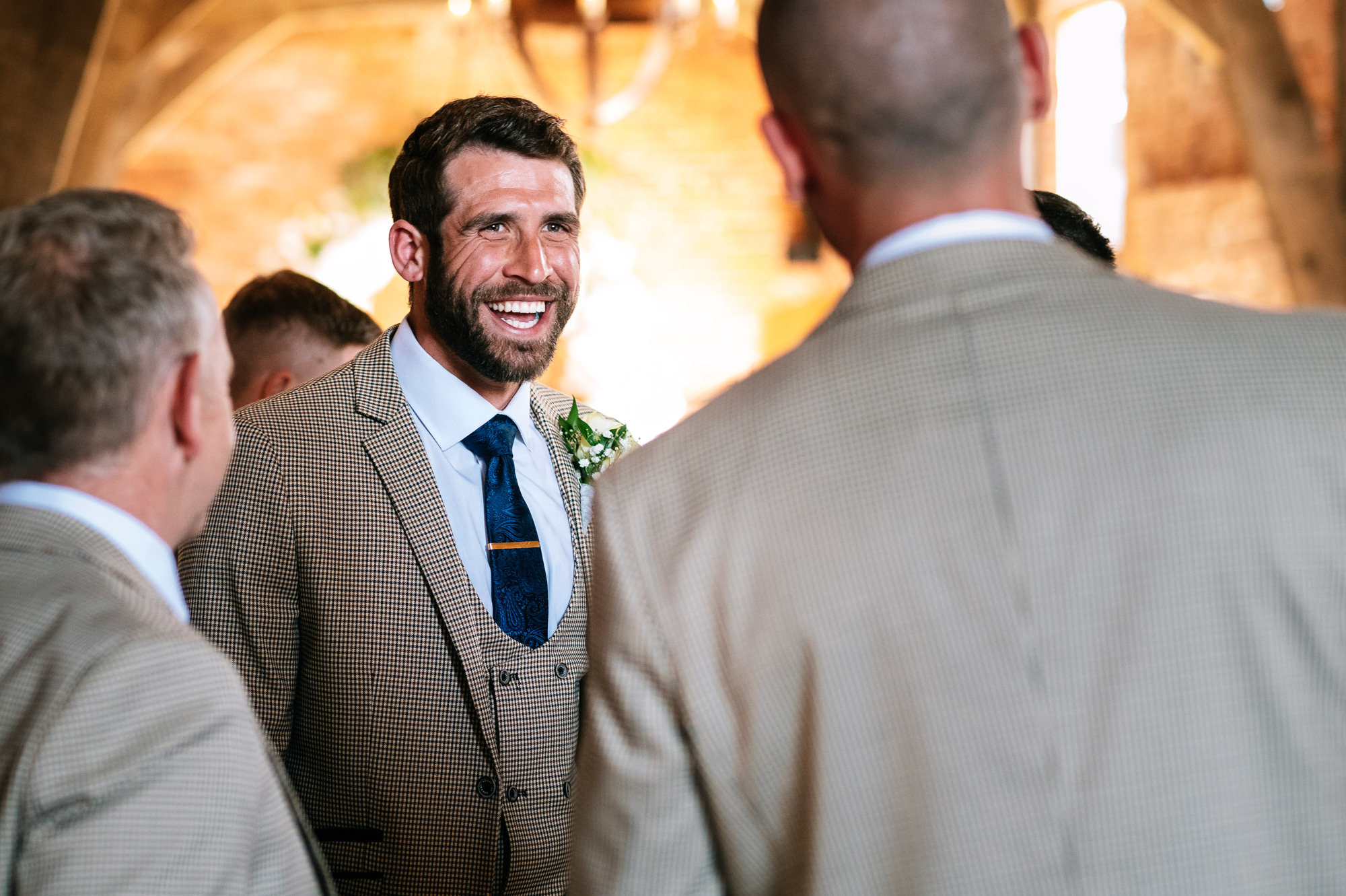 happy smiling groomsmen