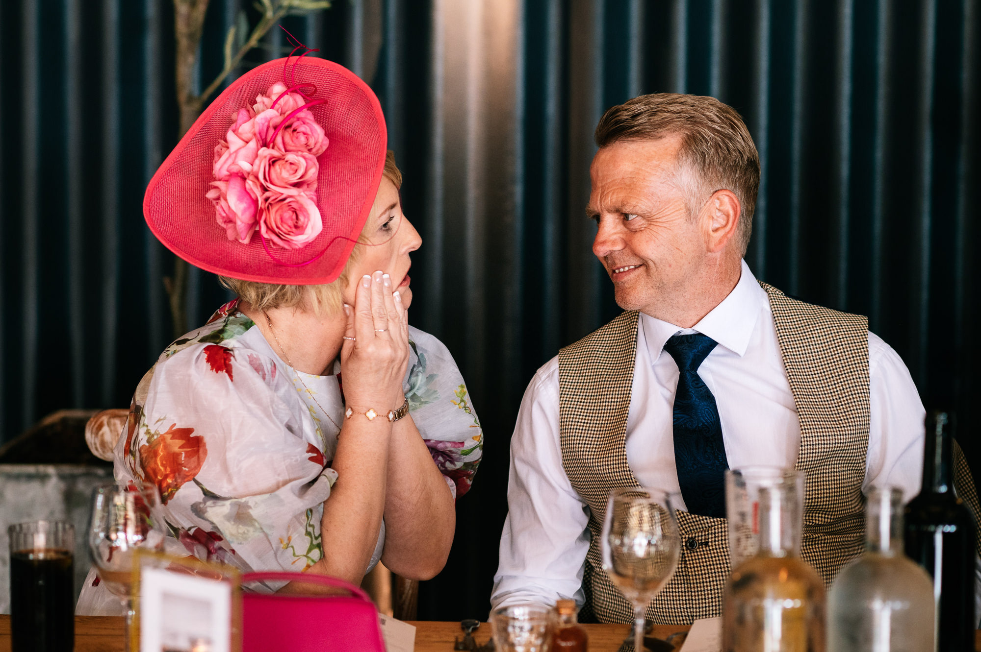 groom's parents having fun before the speeches
