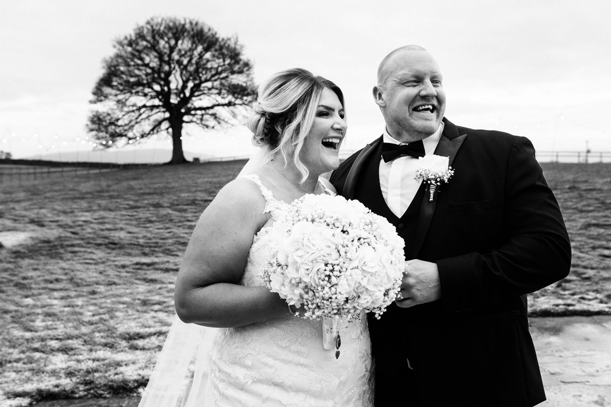 relaxed and fun wedding portraits at heaton house farm during winter