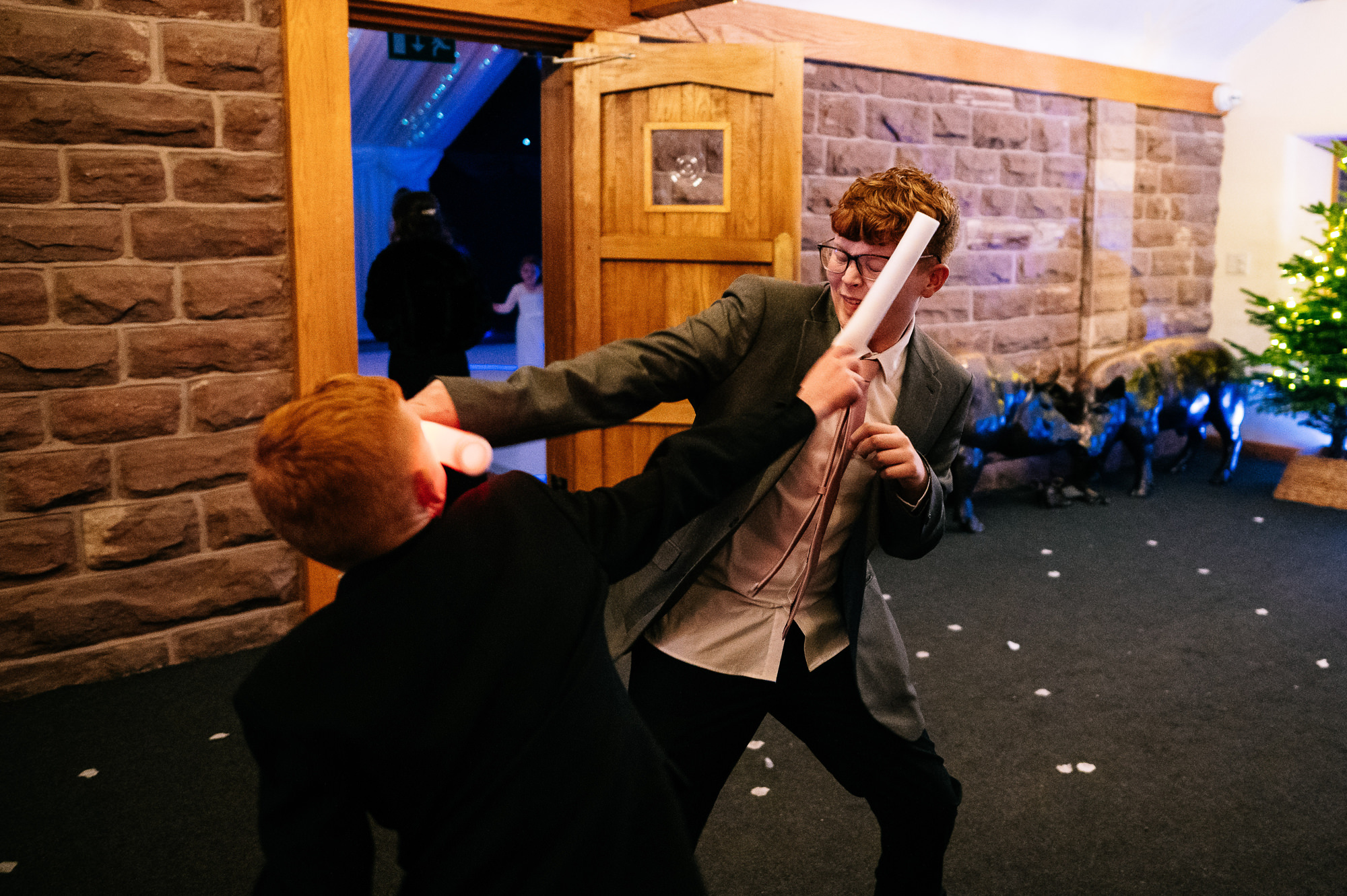 kids fighting at a wedding