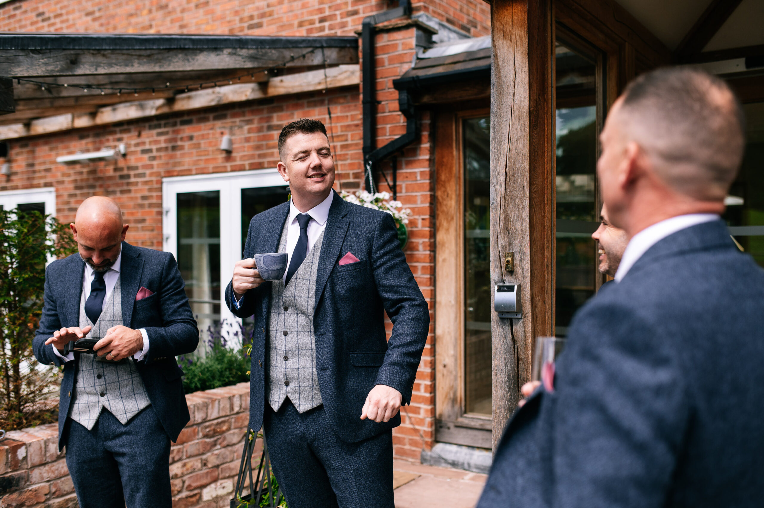 groom enjoying a cuppa outside manor house alsager