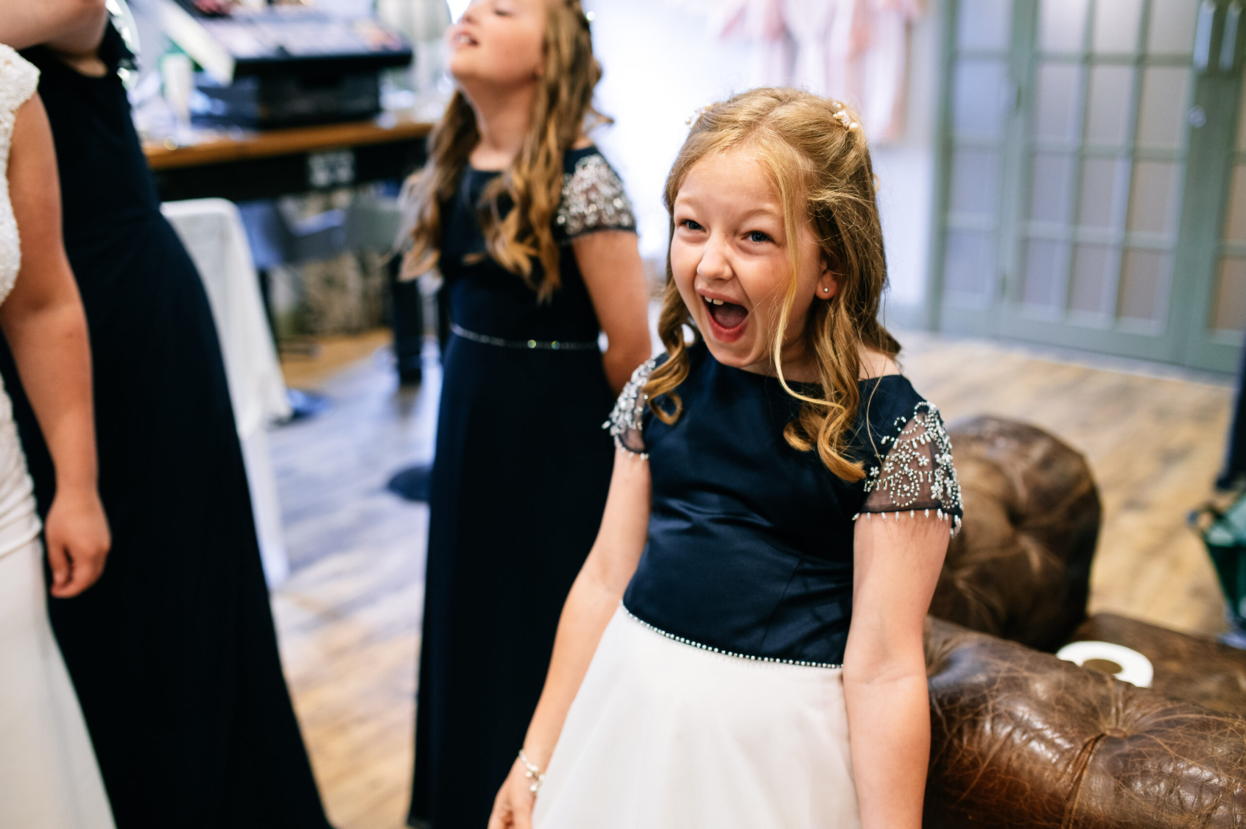 excited little girl at a wedding