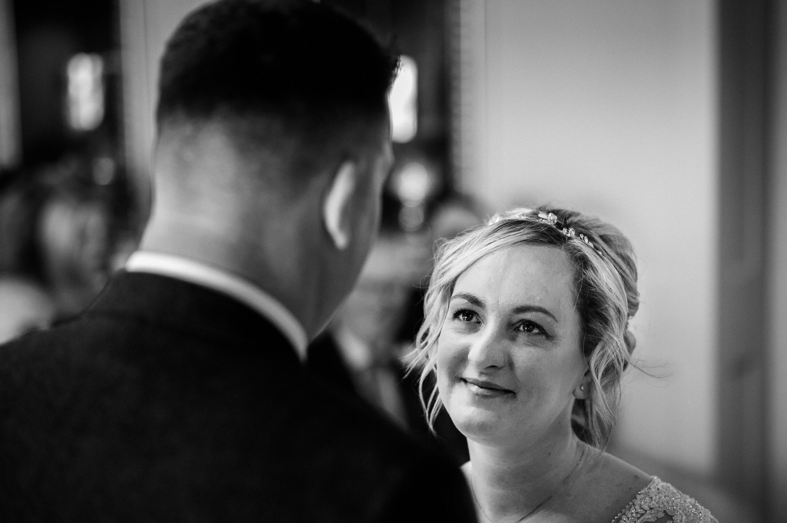emotional bride with tears in her eyes during vows