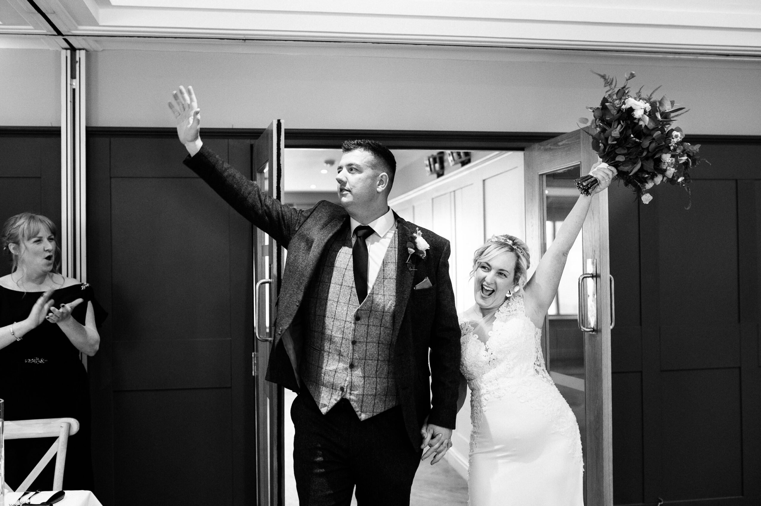 excited newlyweds announced into their reception