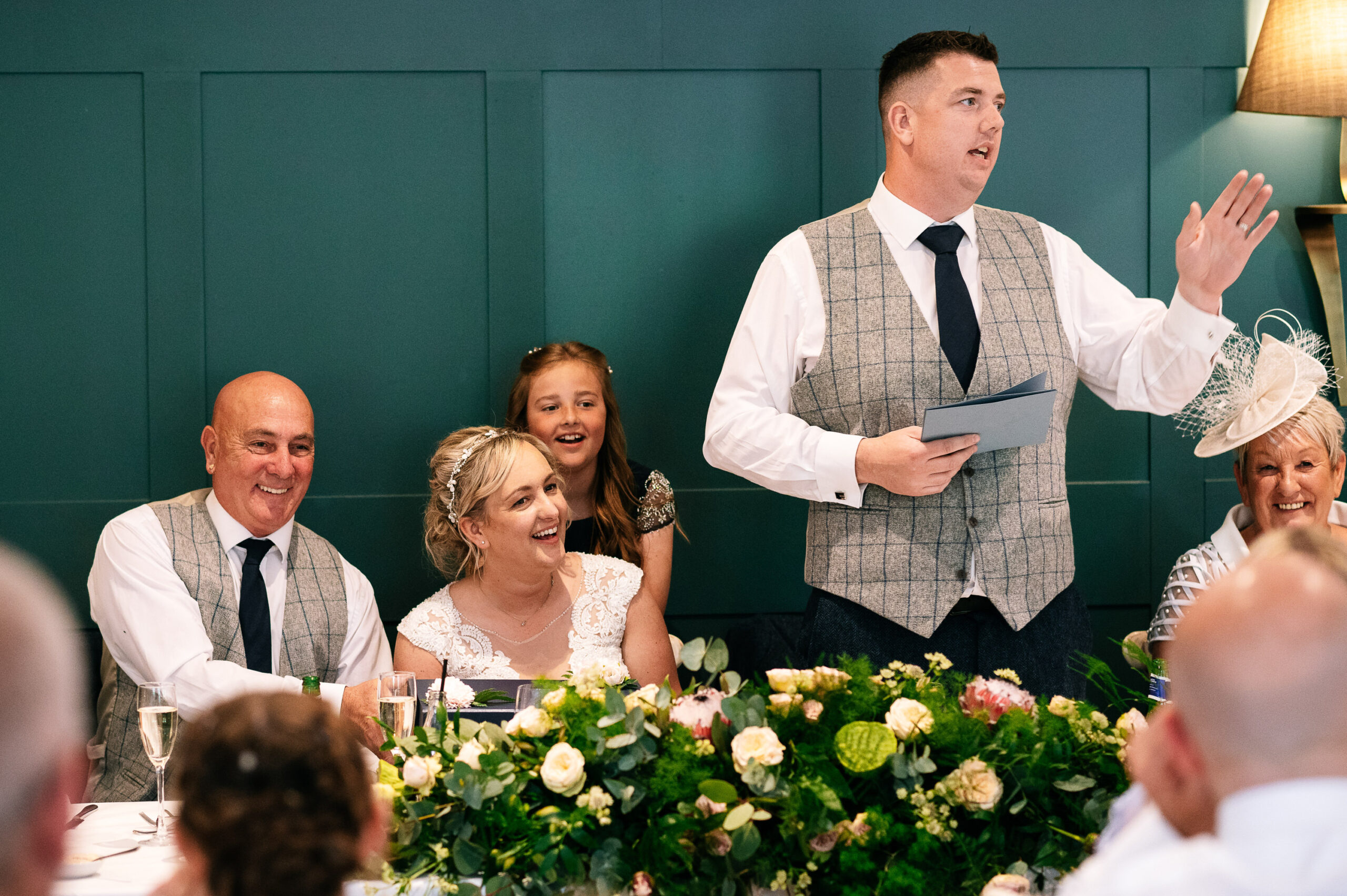 all smiles during the grooms speech