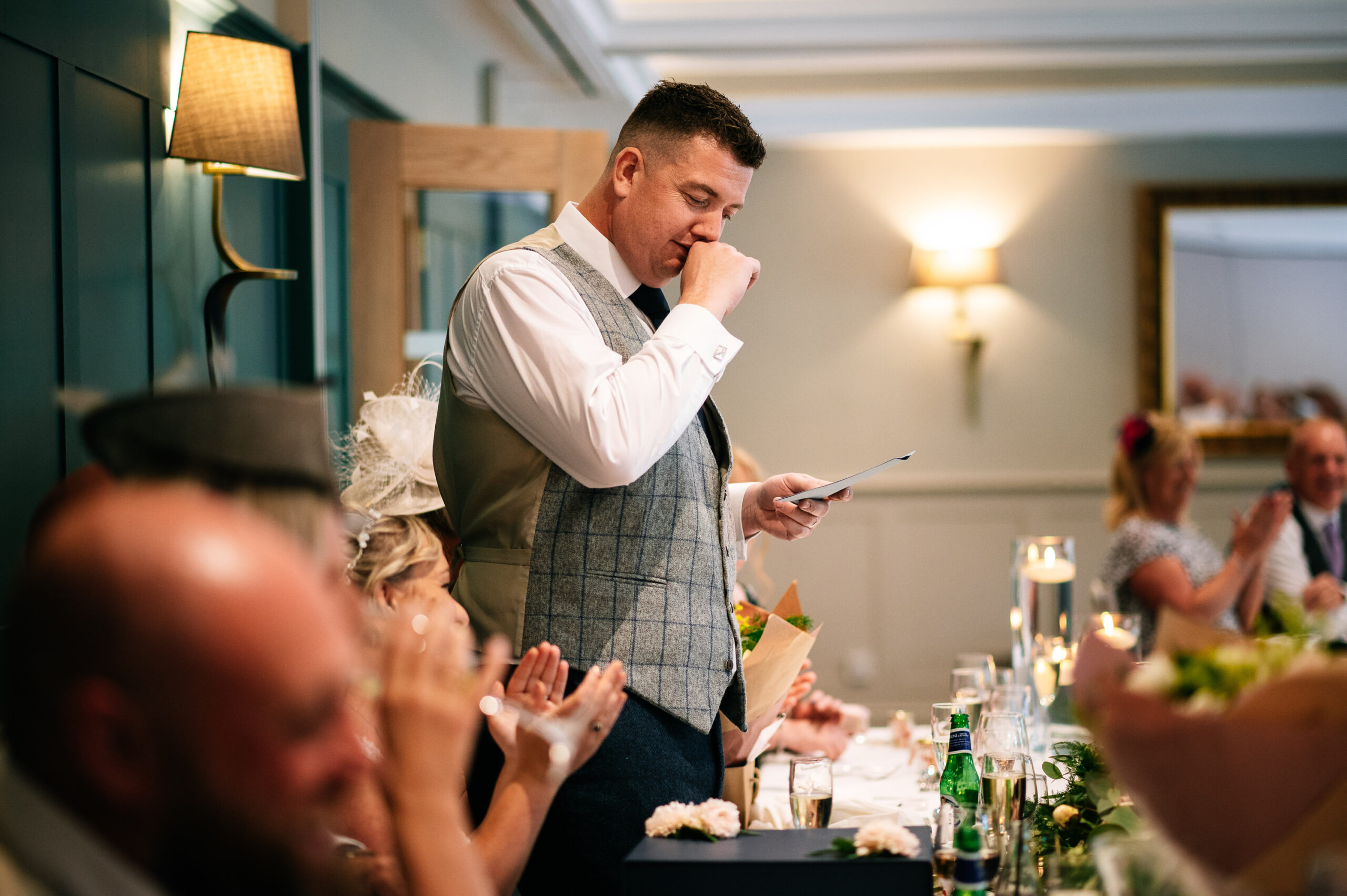 groom gets a little choked up during his speech