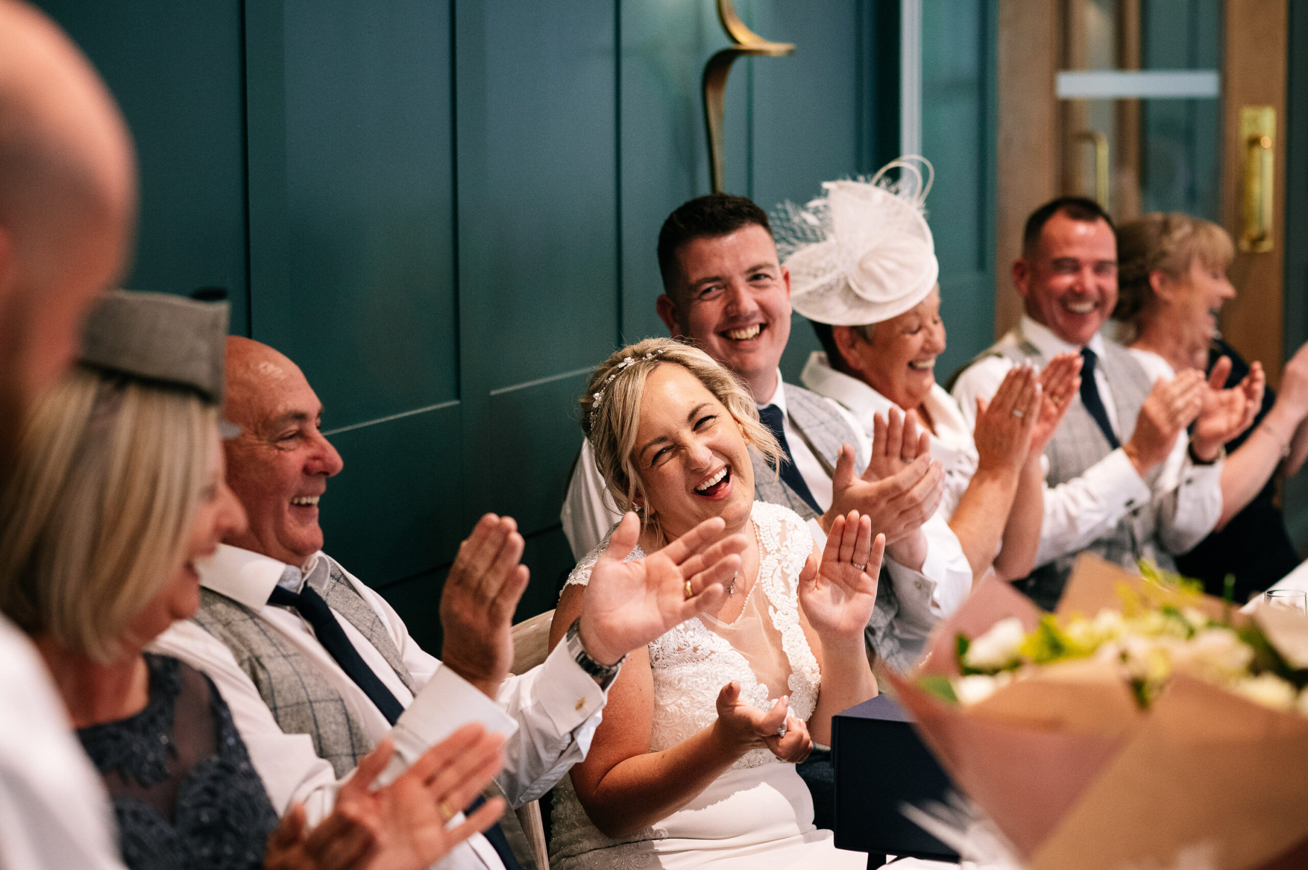 top table laughing and clapping