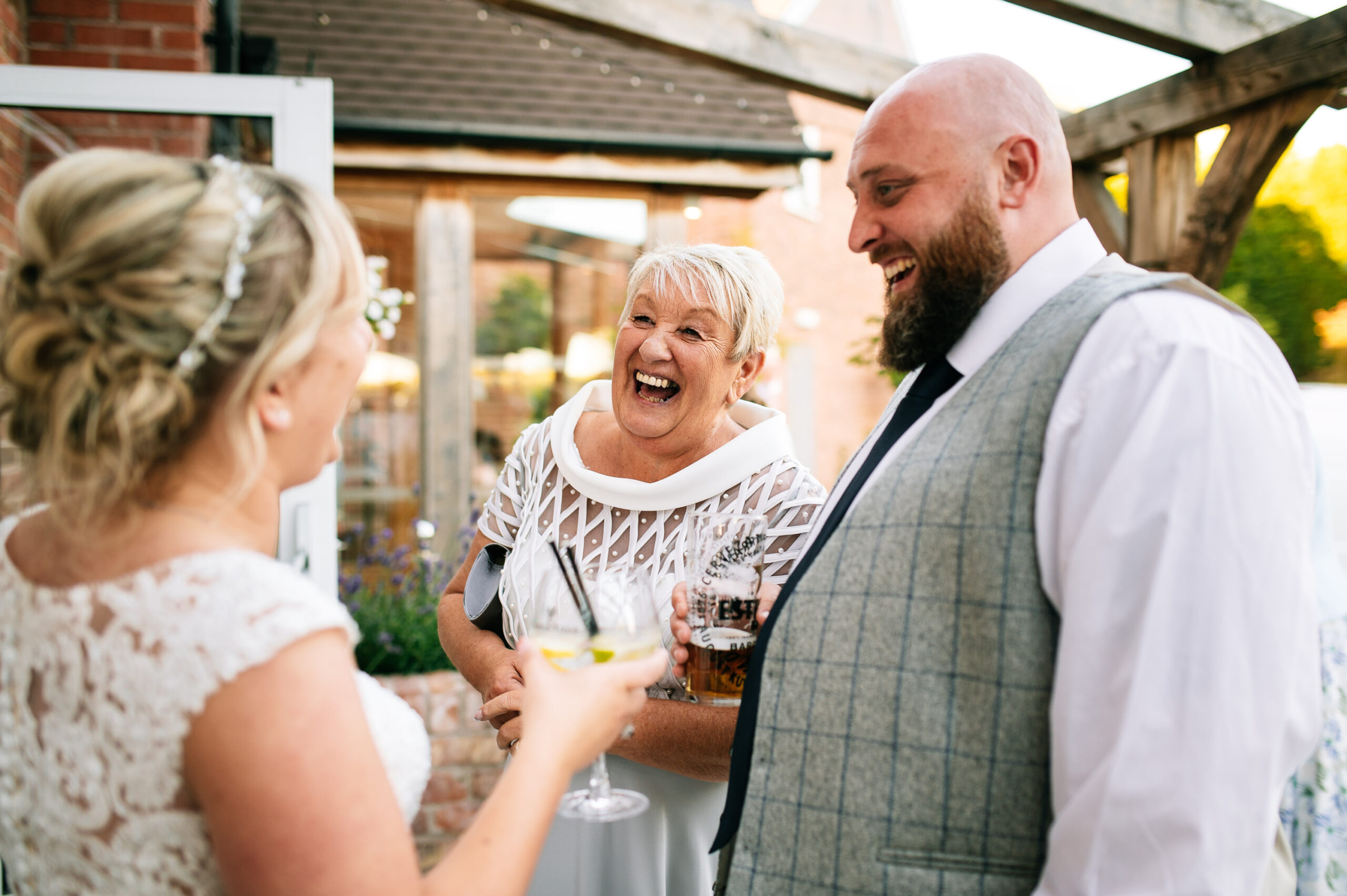 bride chatting with happy guests