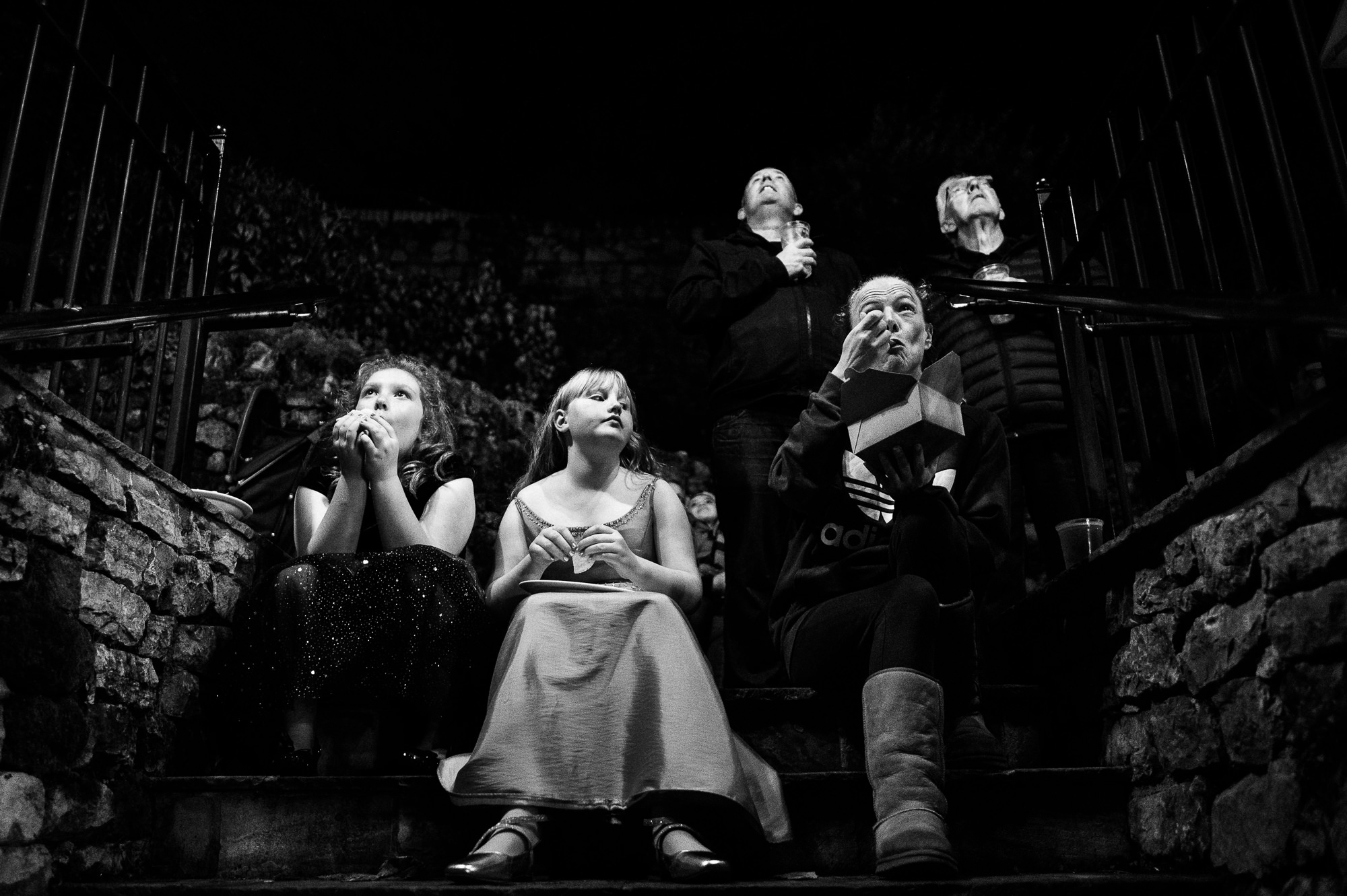 kids sat on steps outdoors