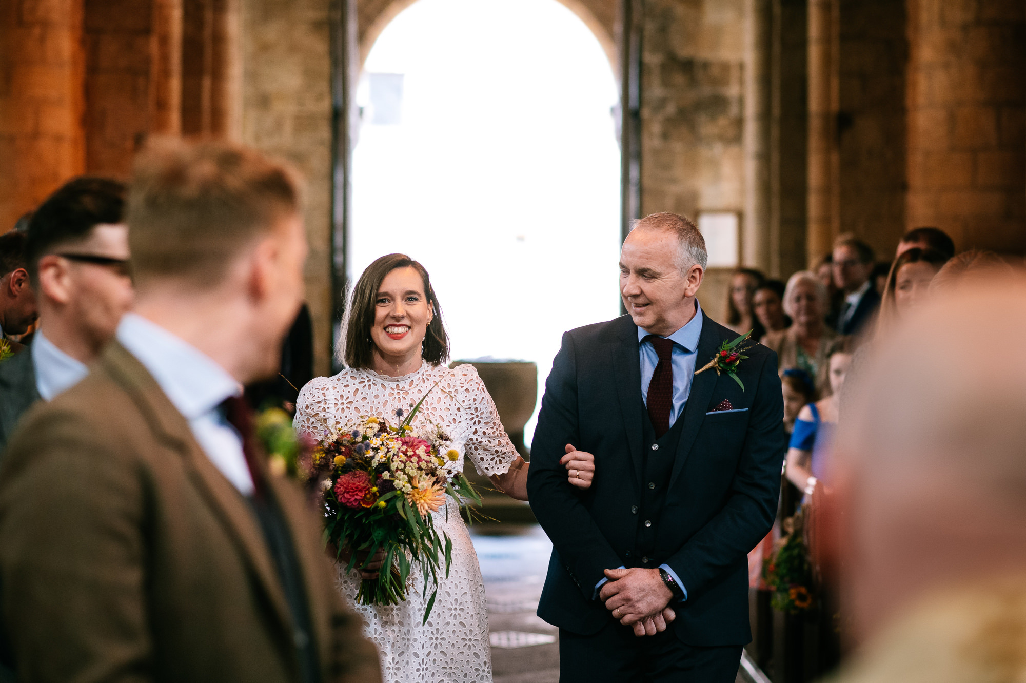 bride walking down the aisle of melbourne parish church