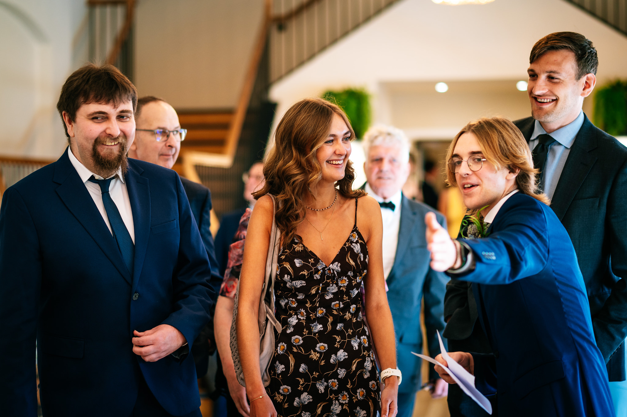 ushers showing guests to their seats