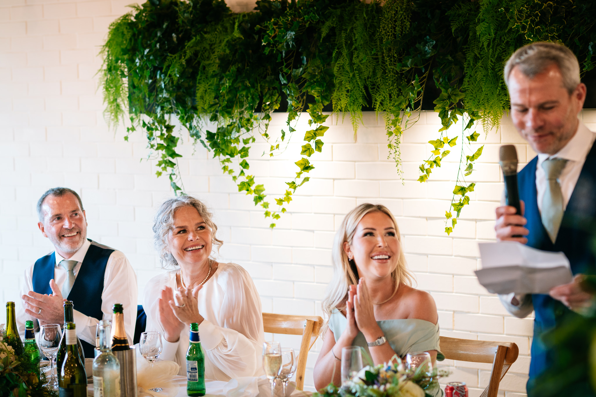 wedding top table applauding during a speech
