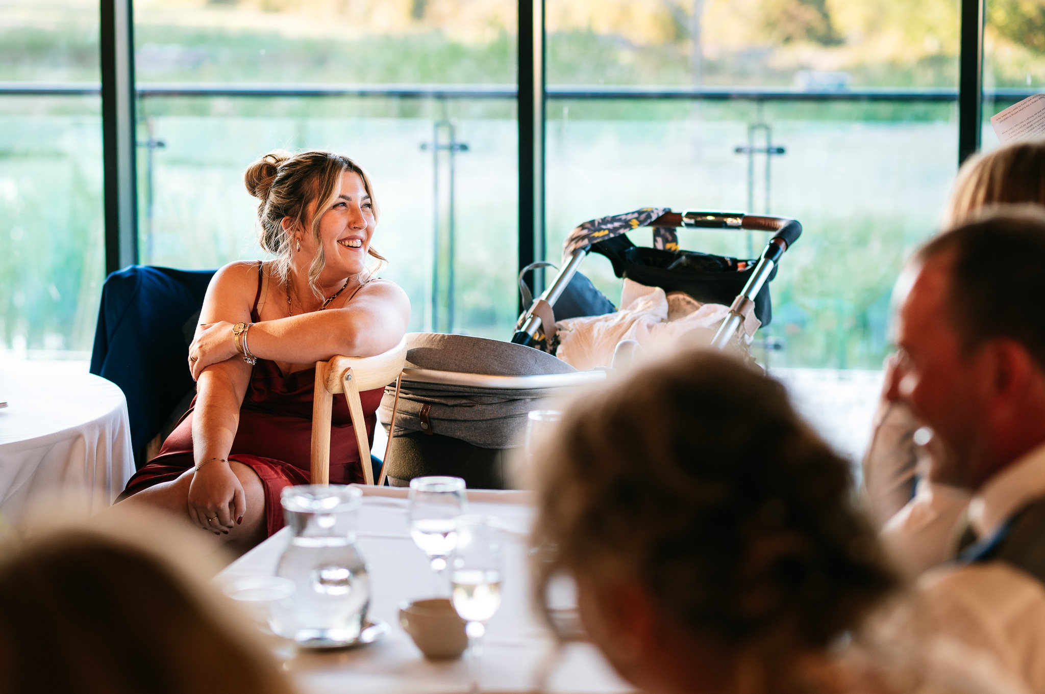 happy smiling lady looking up during the speeches