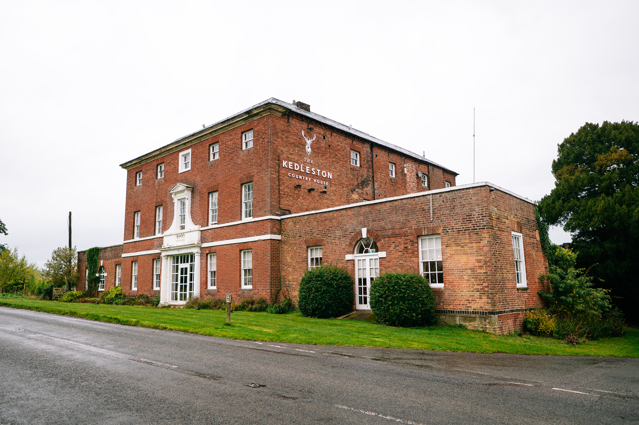 the view from the road of the kedleston country house wedding venue