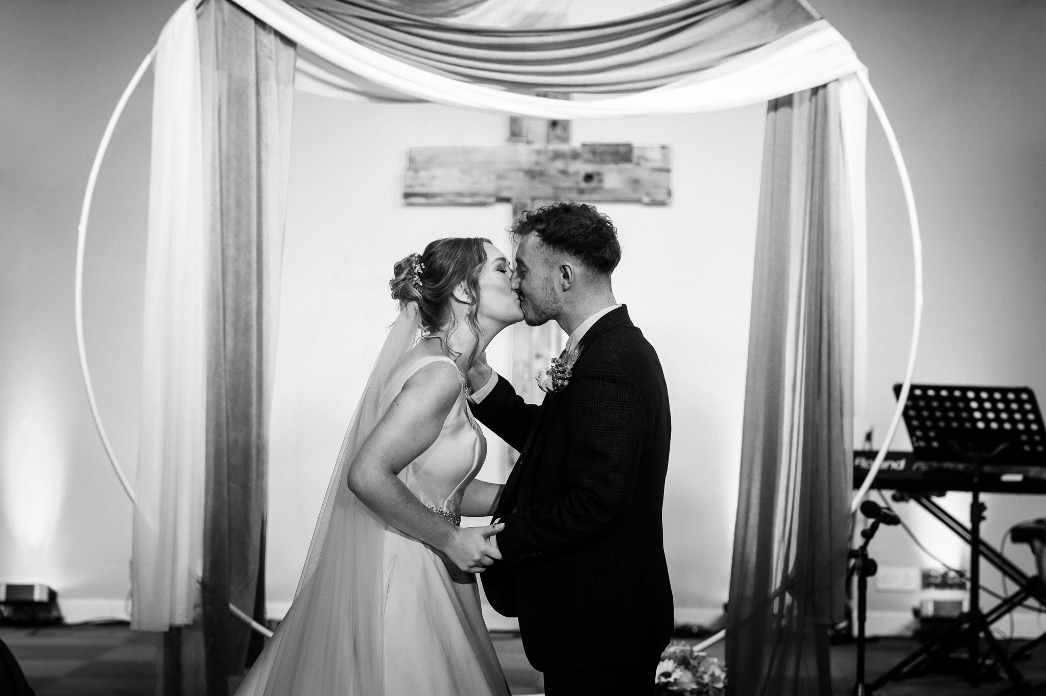couple share their first kiss after getting married