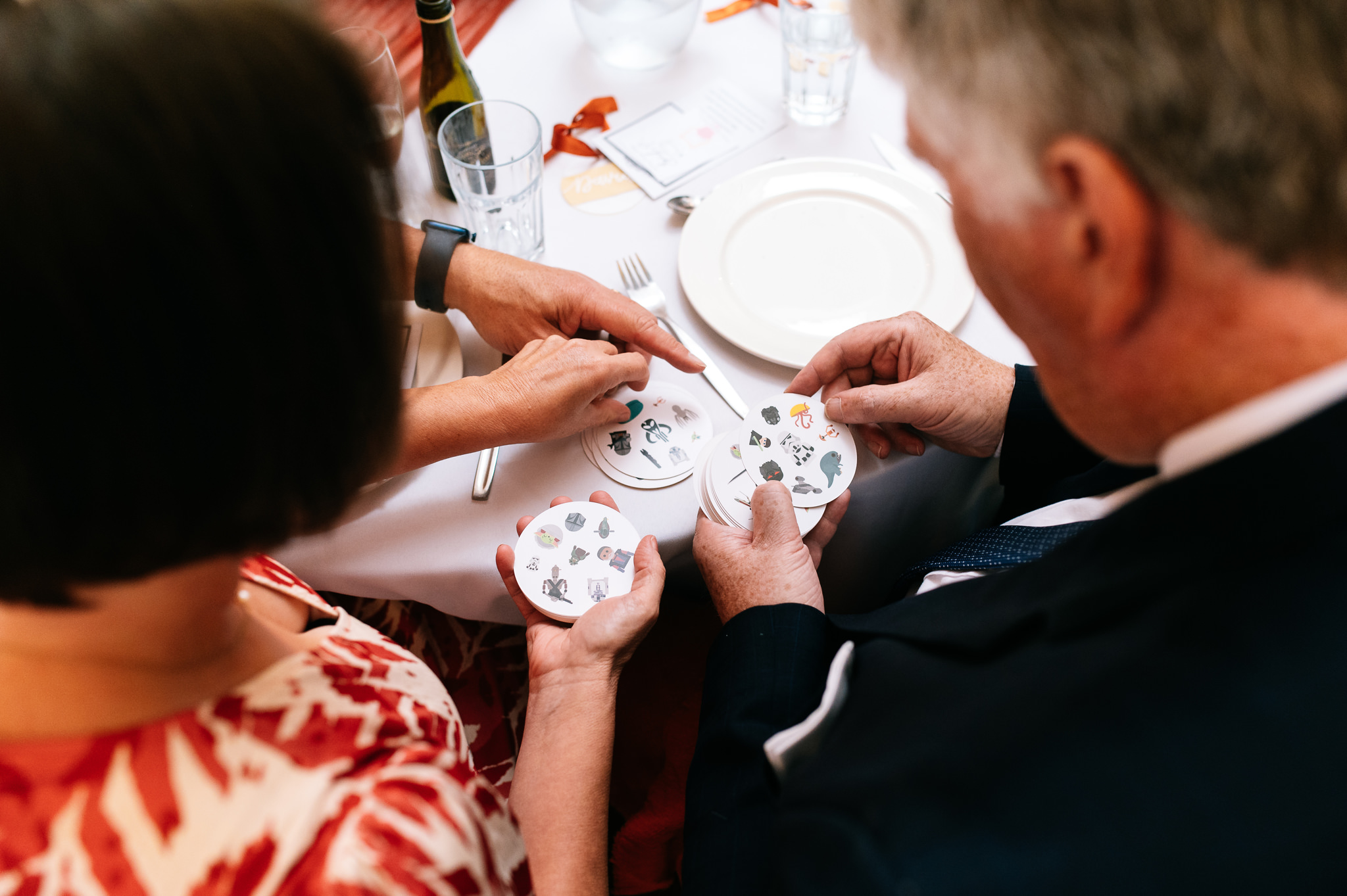 wedding guests playing dobble at their table