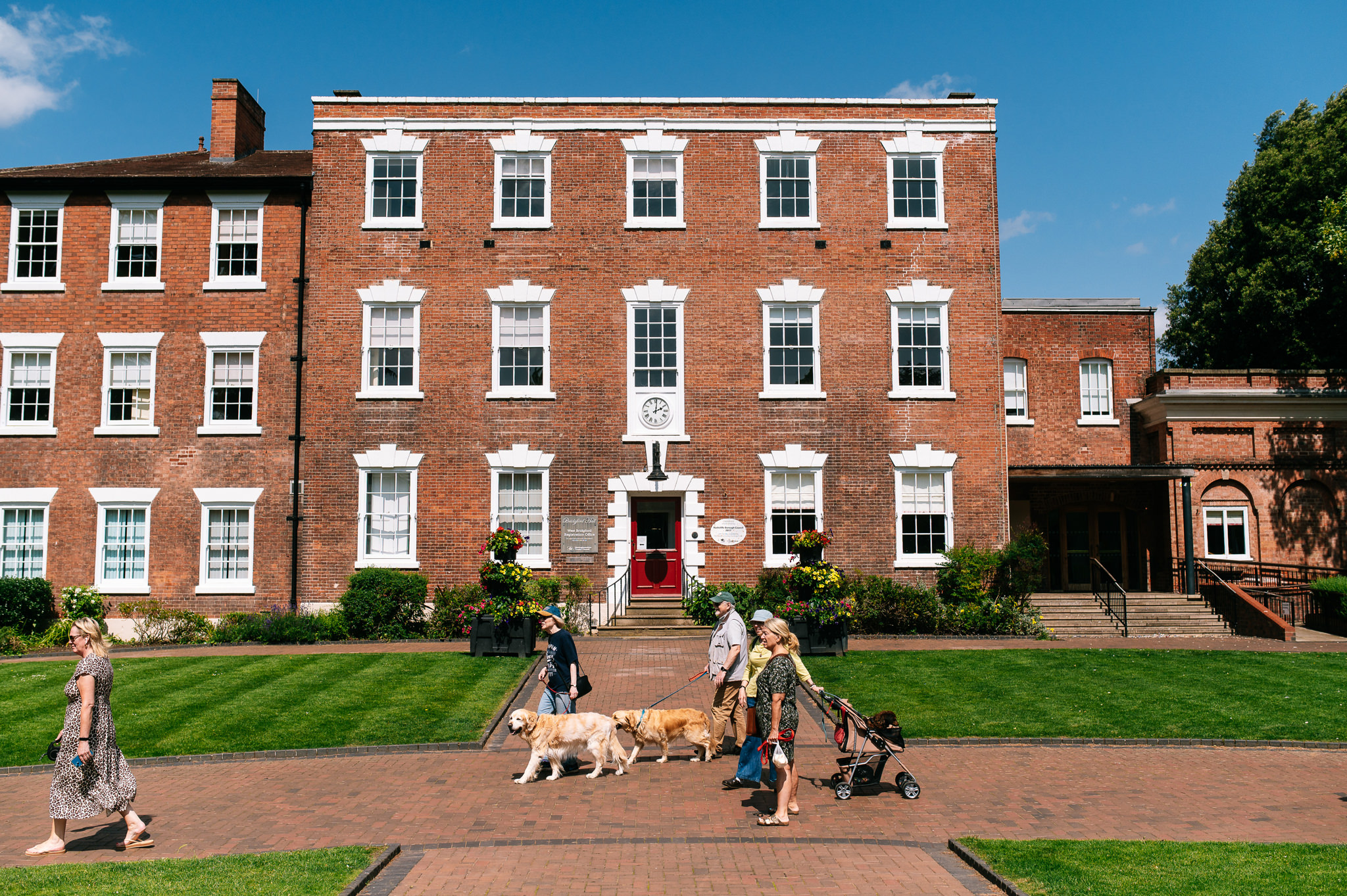 exterior of bridgford hall on a sunny day with a bright blue sky